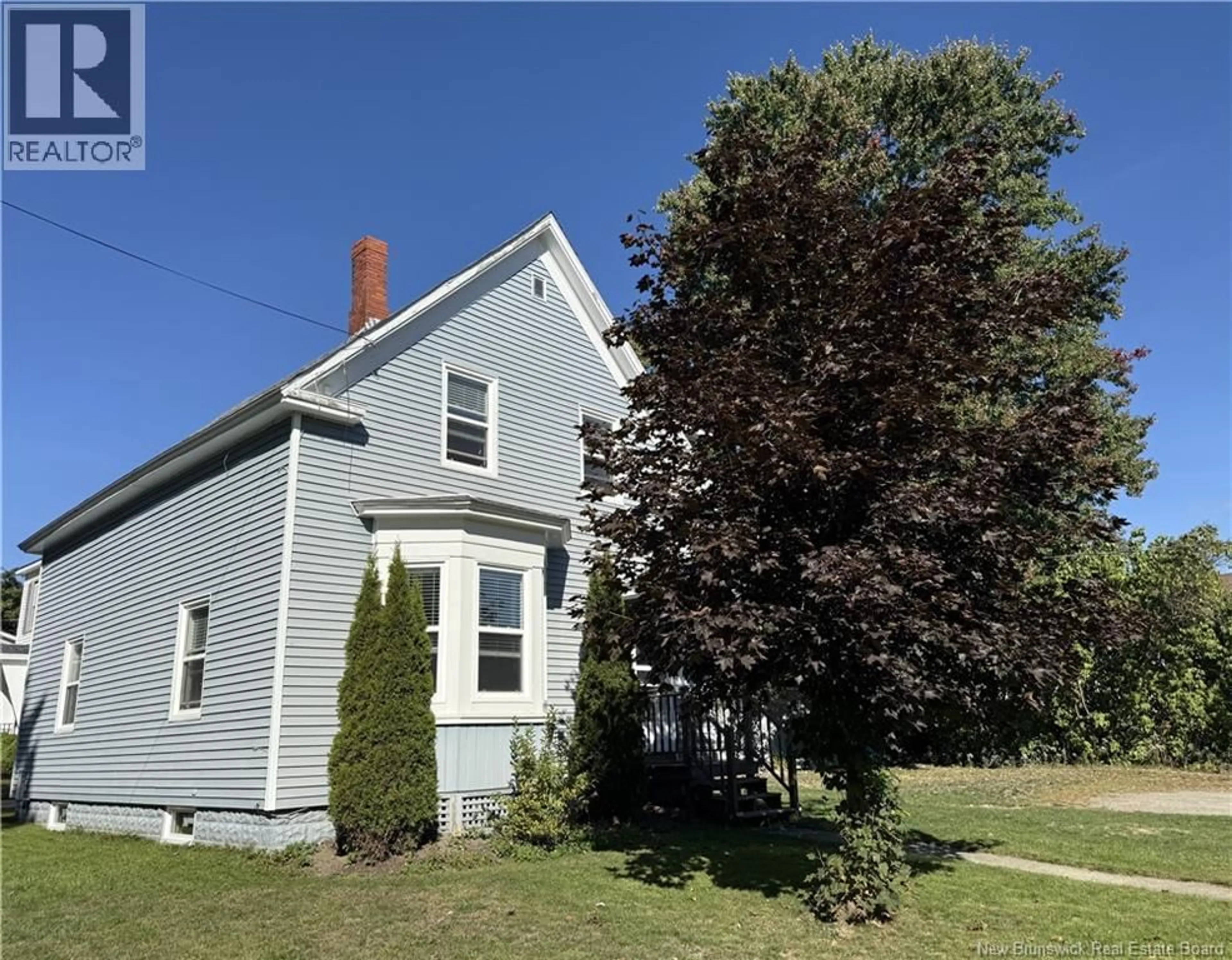 A pic from outside/outdoor area/front of a property/back of a property/a pic from drone, street for 48 MAIN STREET, St. Stephen New Brunswick E3L1Z6