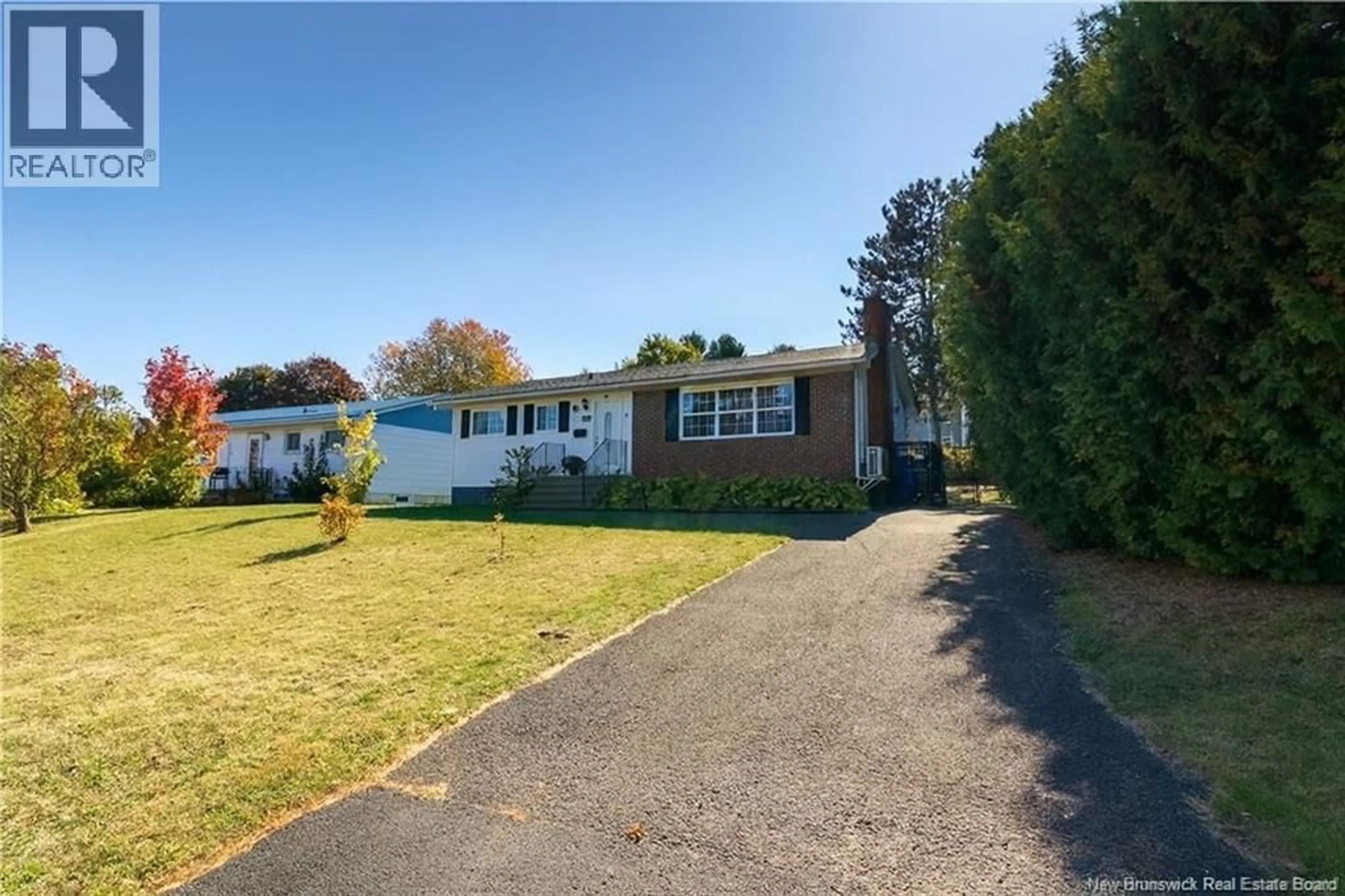 A pic from outside/outdoor area/front of a property/back of a property/a pic from drone, street for 411 COVERT STREET, Oromocto New Brunswick E2V1E8