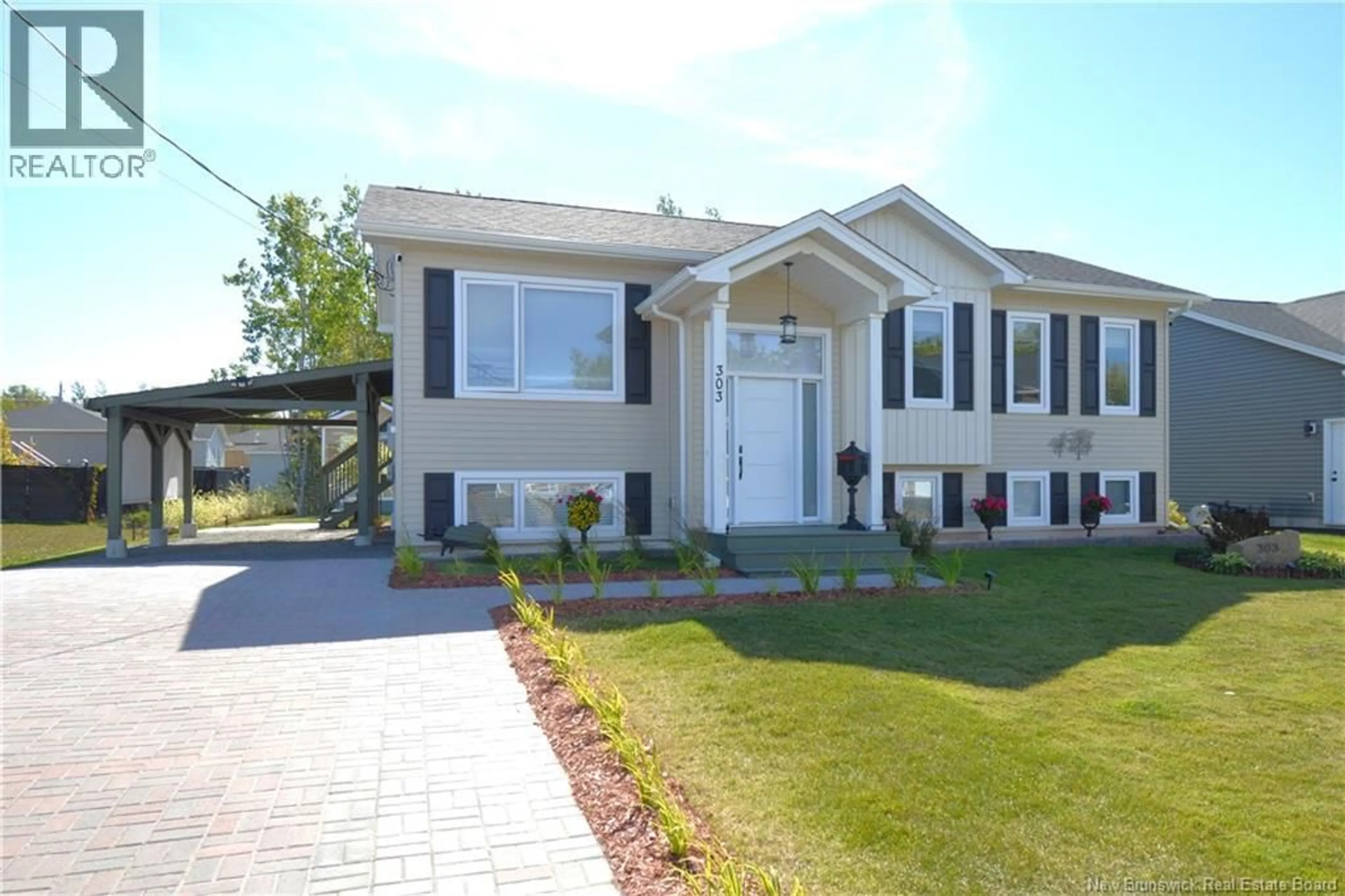 Home with vinyl exterior material, street for 303 CHATELLERAULT, Shediac New Brunswick E4P0L3