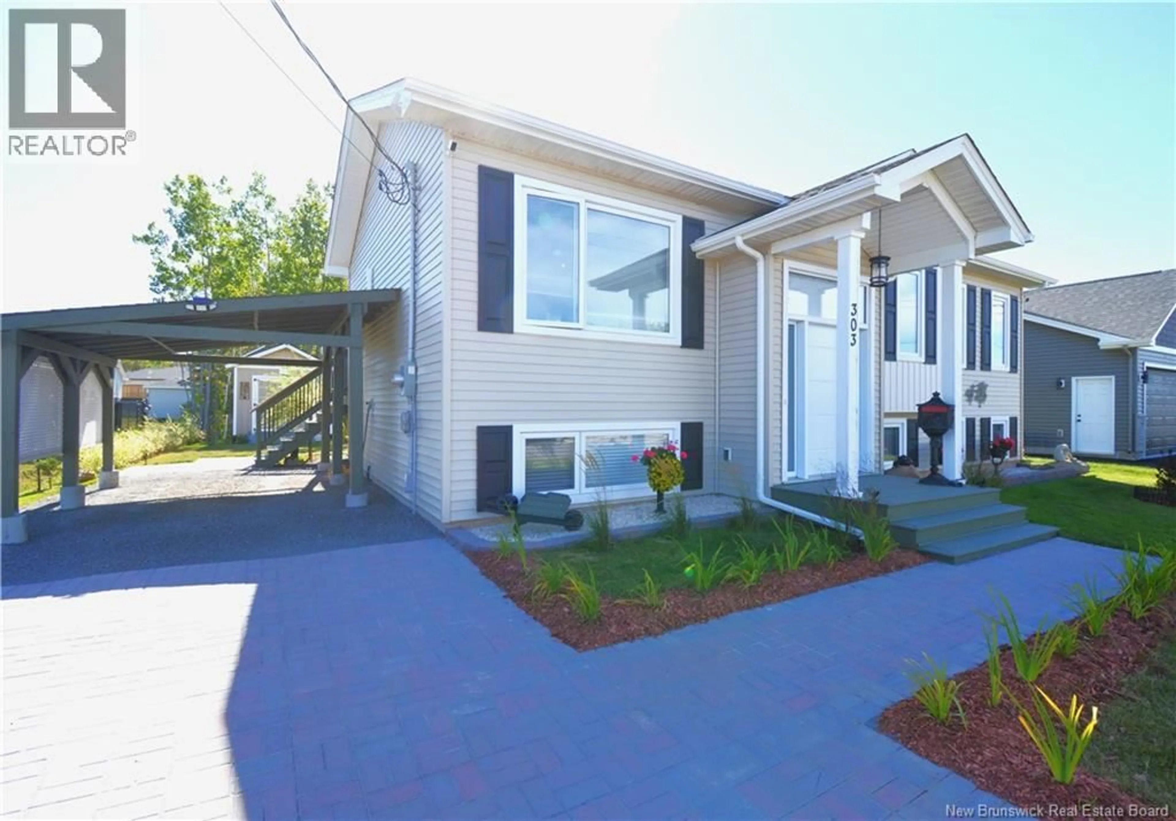 Home with vinyl exterior material, street for 303 CHATELLERAULT, Shediac New Brunswick E4P0L3