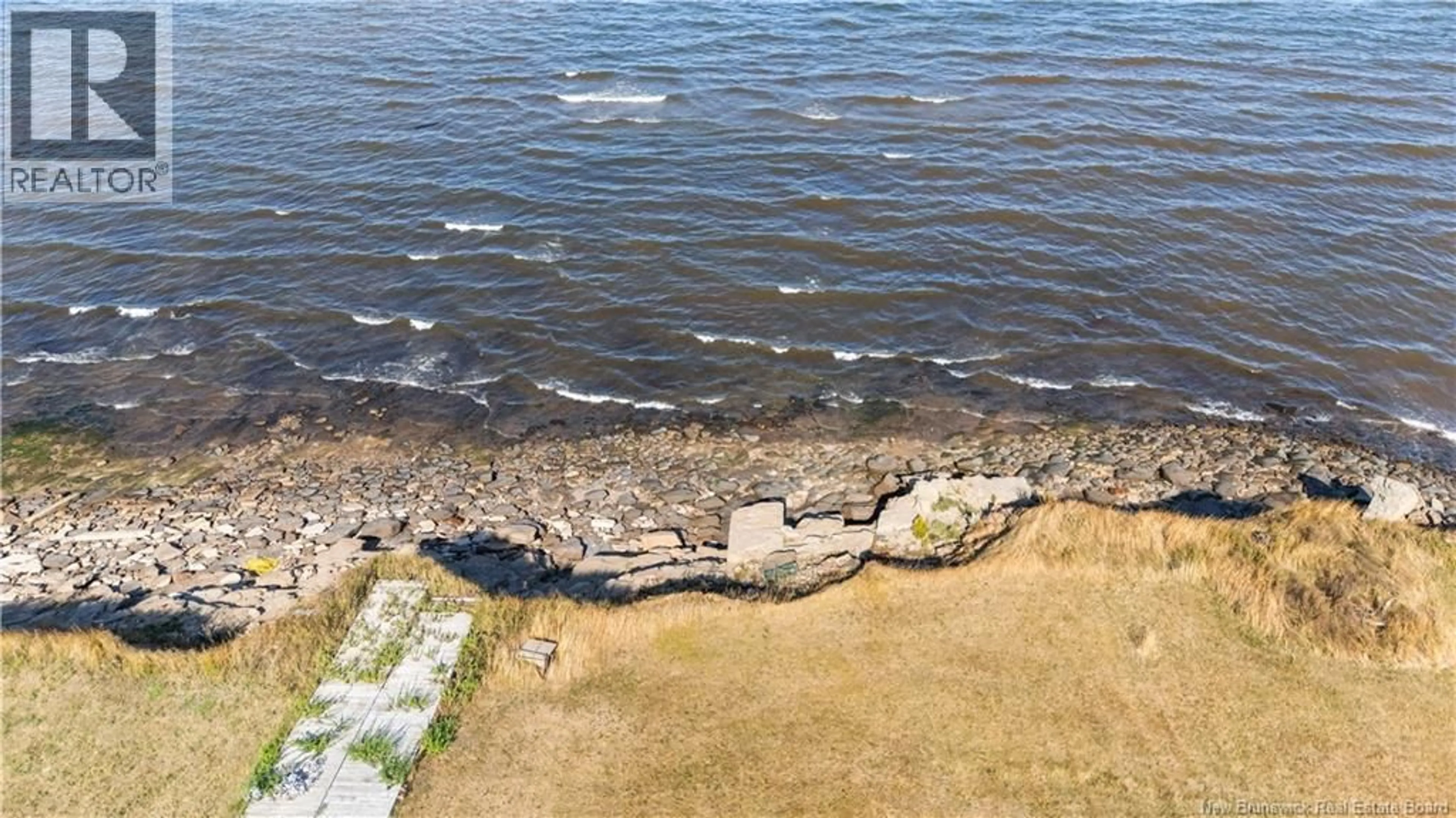 A pic from outside/outdoor area/front of a property/back of a property/a pic from drone, water/lake/river/ocean view for 2106 ROUTE 950 ROUTE, Cap-Pelé New Brunswick E4N2J6