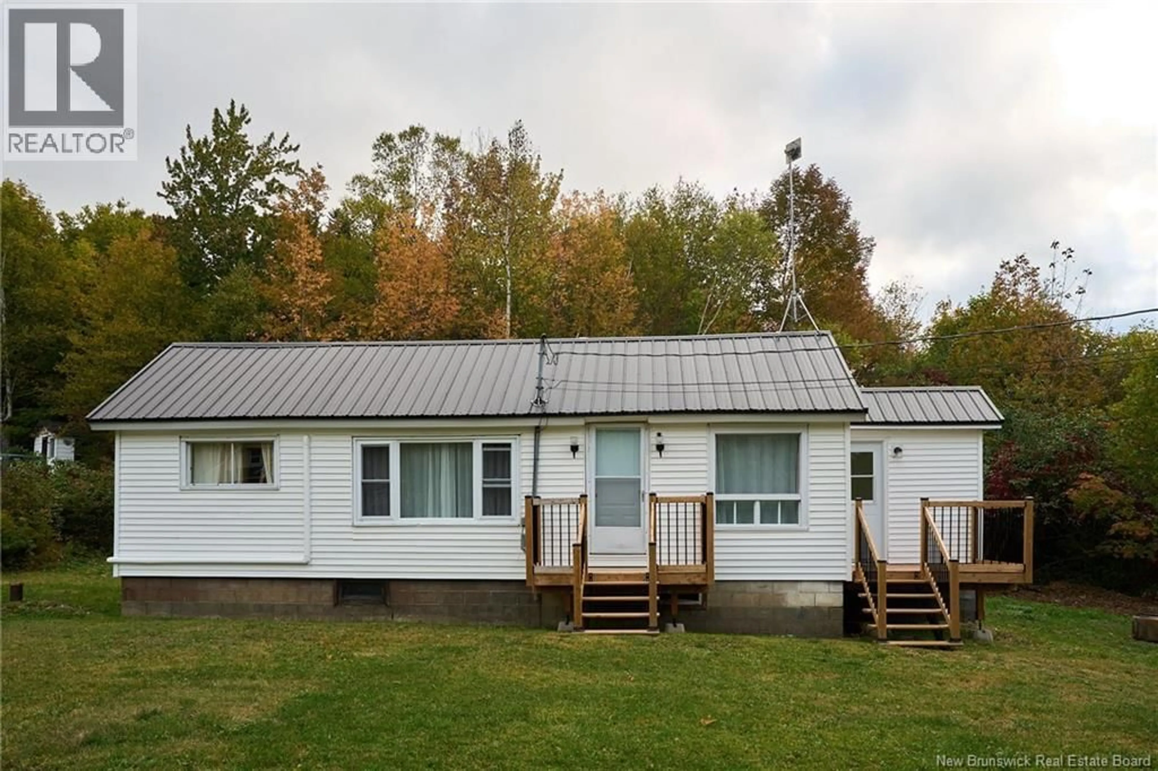 Home with vinyl exterior material, building for 4032 104 ROUTE, Millville New Brunswick E6E1S9