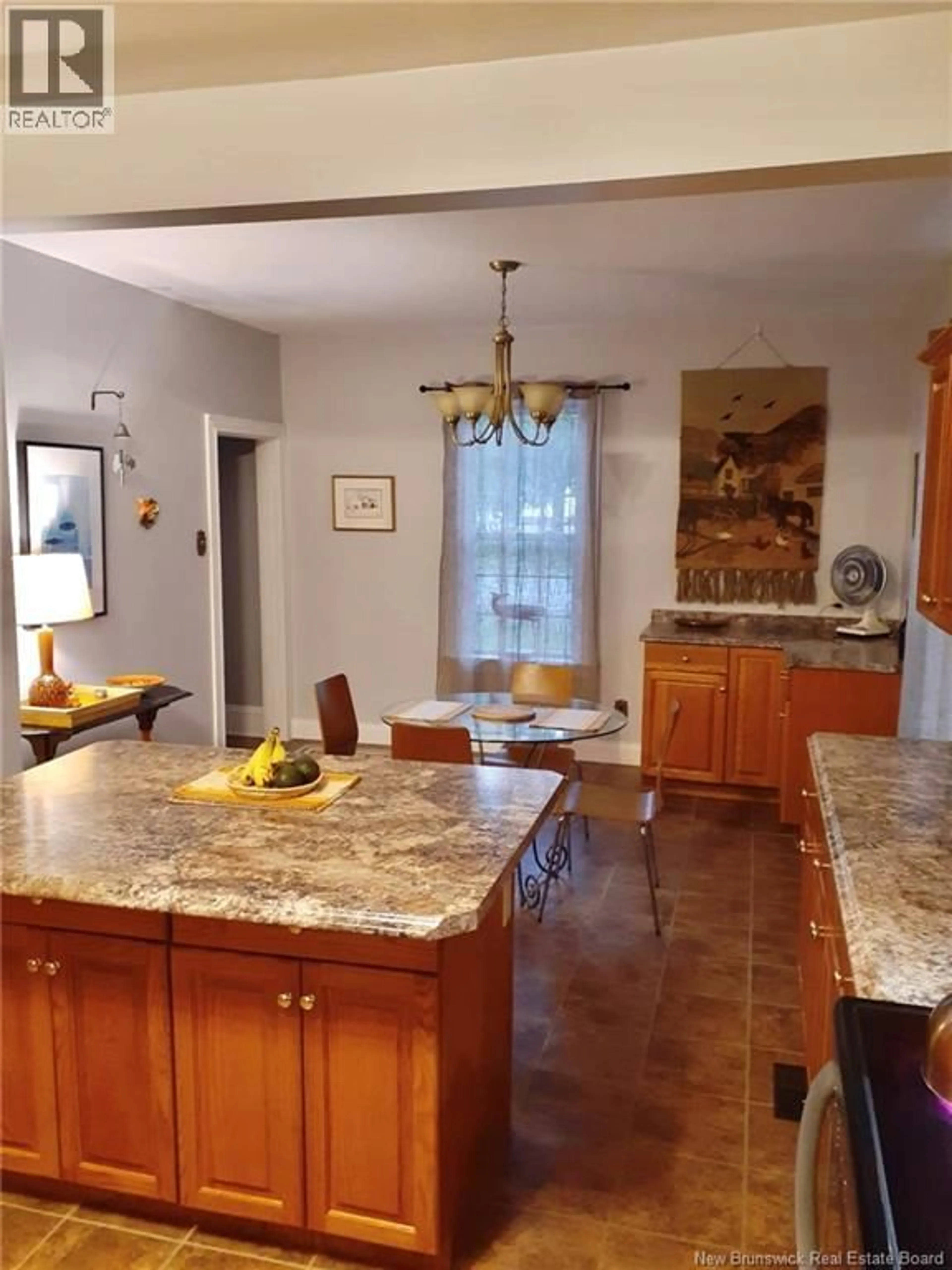 Open concept kitchen, ceramic/tile floor for 13 DEPOT STREET, McAdam New Brunswick E6J1T9