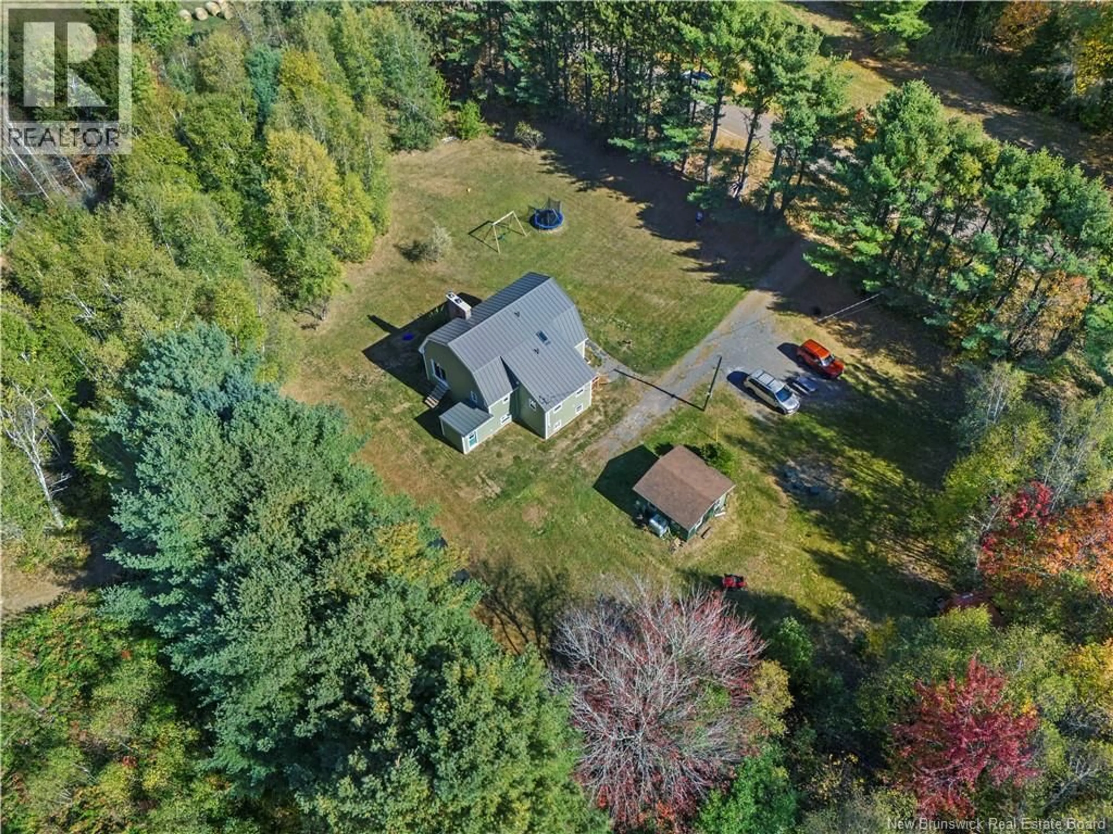 A pic from outside/outdoor area/front of a property/back of a property/a pic from drone, forest/trees view for 41 SPRY EAST ROAD, Jemseg New Brunswick E4C3M3