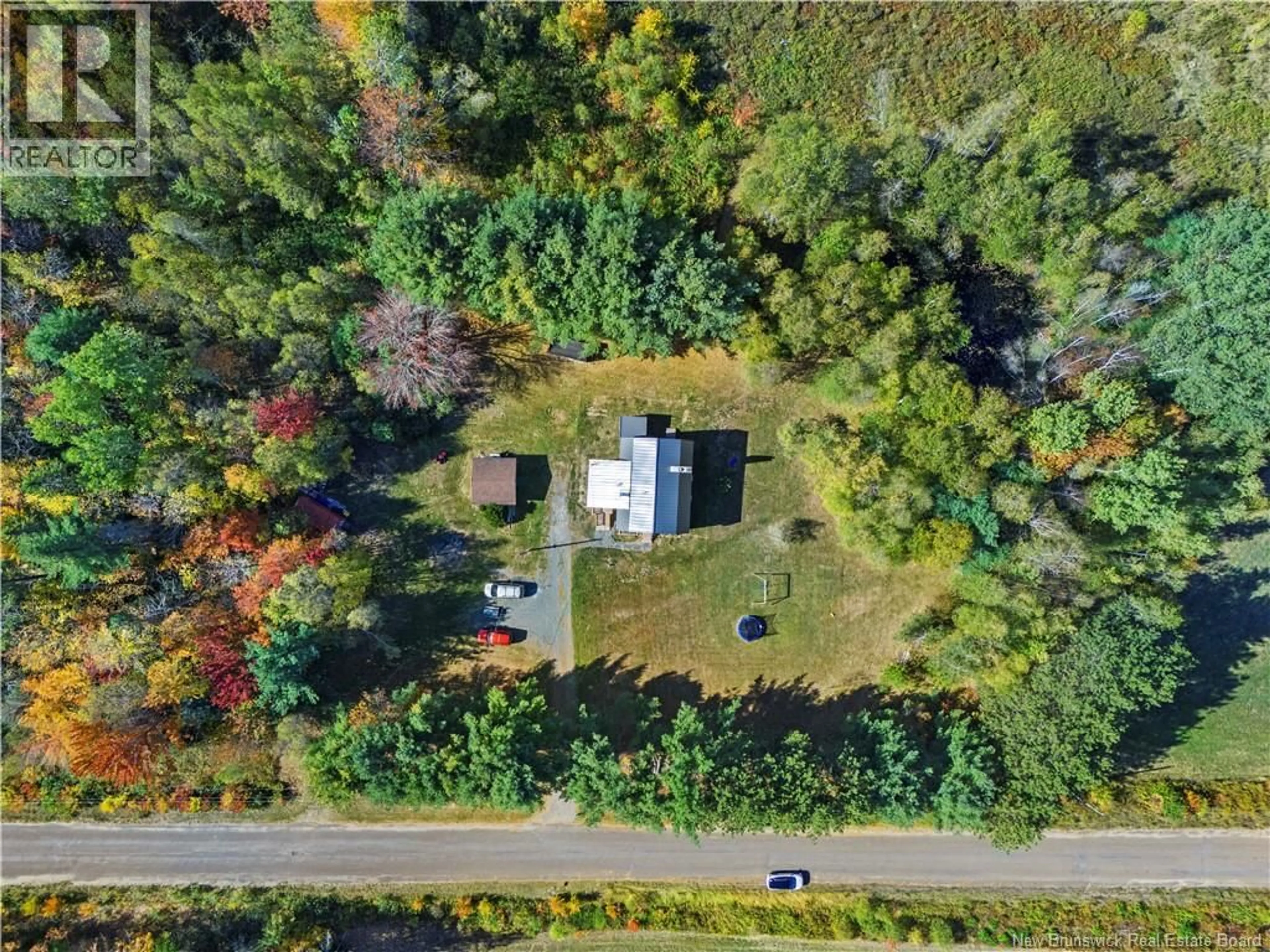 A pic from outside/outdoor area/front of a property/back of a property/a pic from drone, forest/trees view for 41 SPRY EAST ROAD, Jemseg New Brunswick E4C3M3