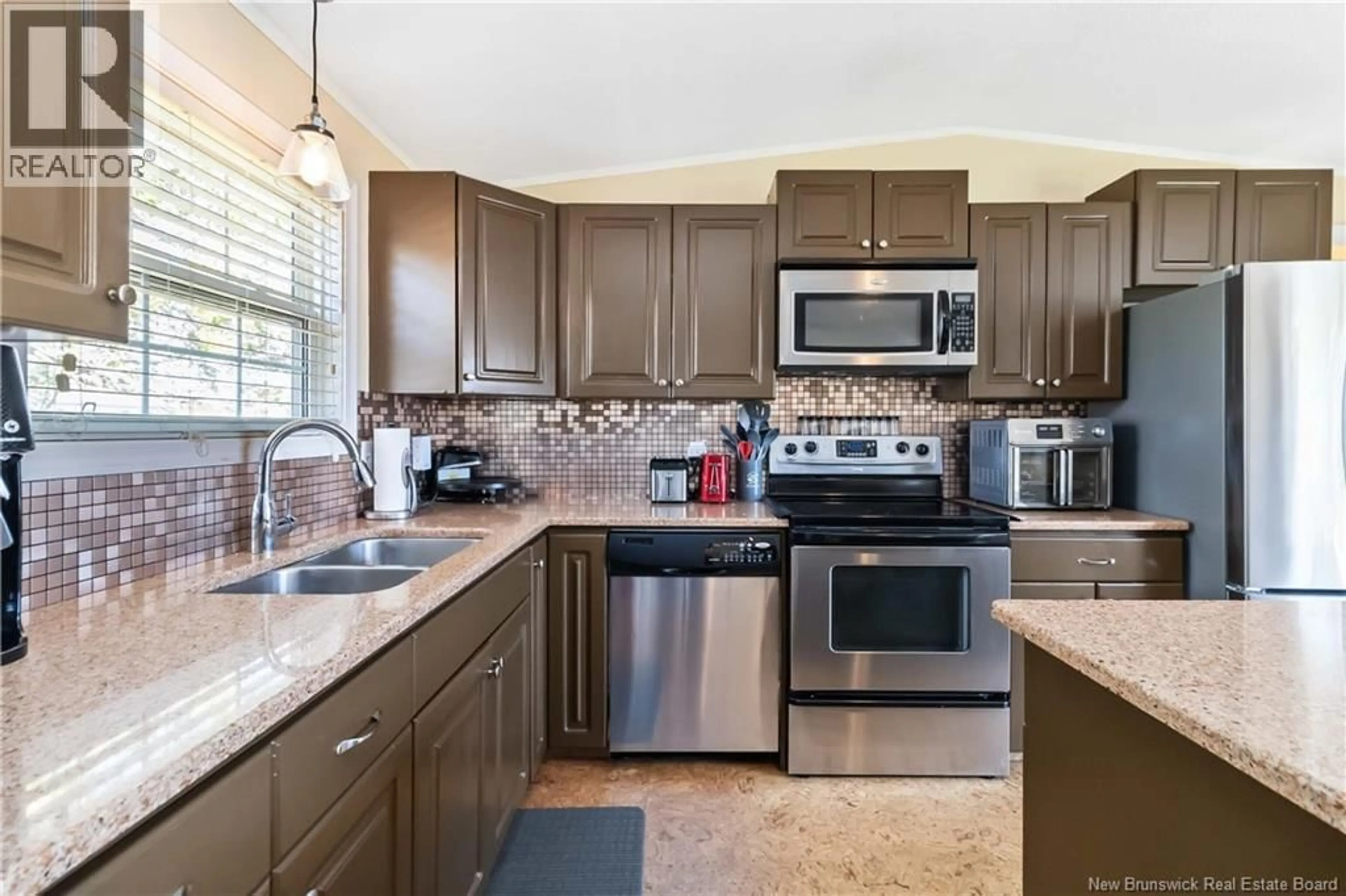 Open concept kitchen, ceramic/tile floor for 10 JASPER STREET, Moncton New Brunswick E1H2X7