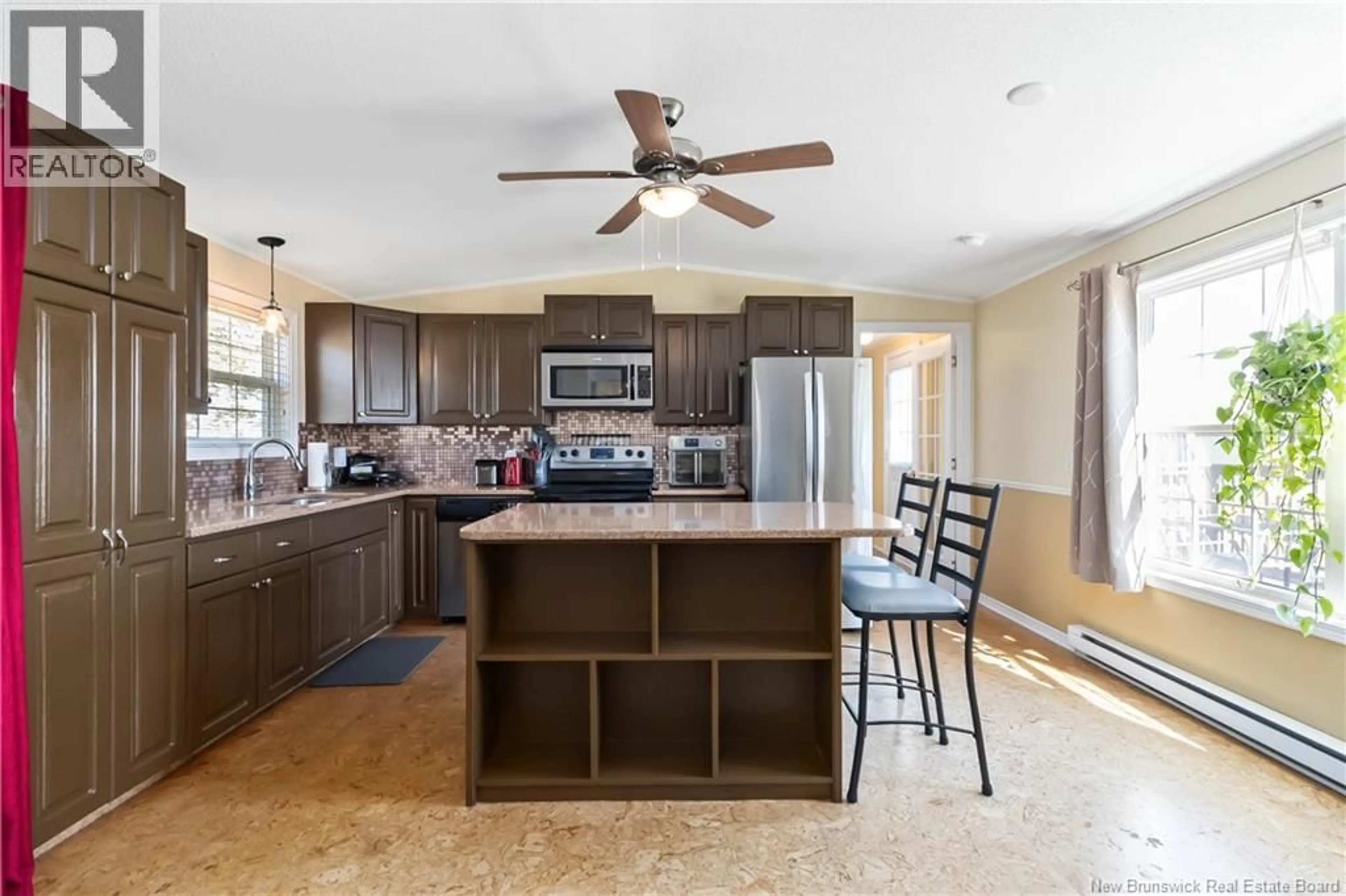Open concept kitchen, ceramic/tile floor for 10 JASPER STREET, Moncton New Brunswick E1H2X7