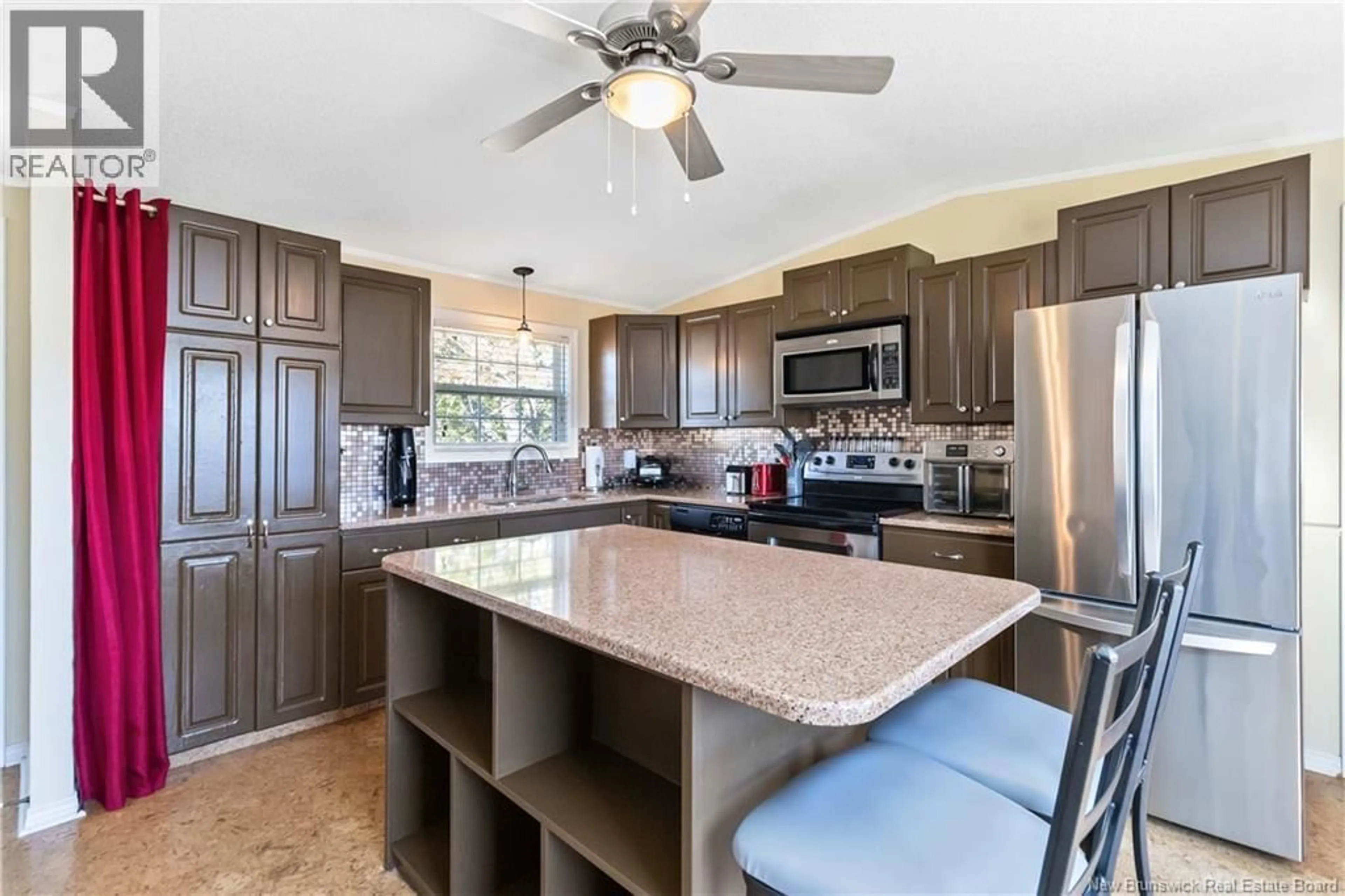 Open concept kitchen, ceramic/tile floor for 10 JASPER STREET, Moncton New Brunswick E1H2X7