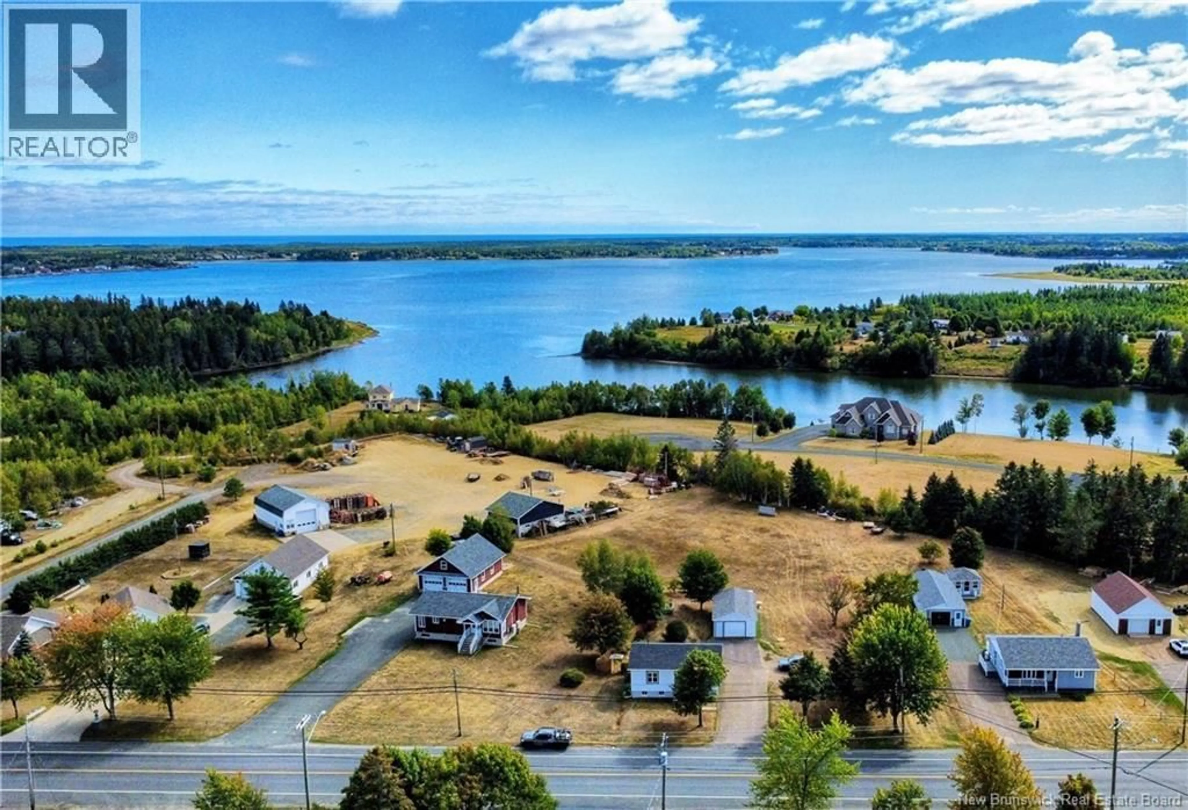 A pic from outside/outdoor area/front of a property/back of a property/a pic from drone, water/lake/river/ocean view for 1060 RUE LOUIS G. DAIGLE, Tracadie New Brunswick E1X1C2