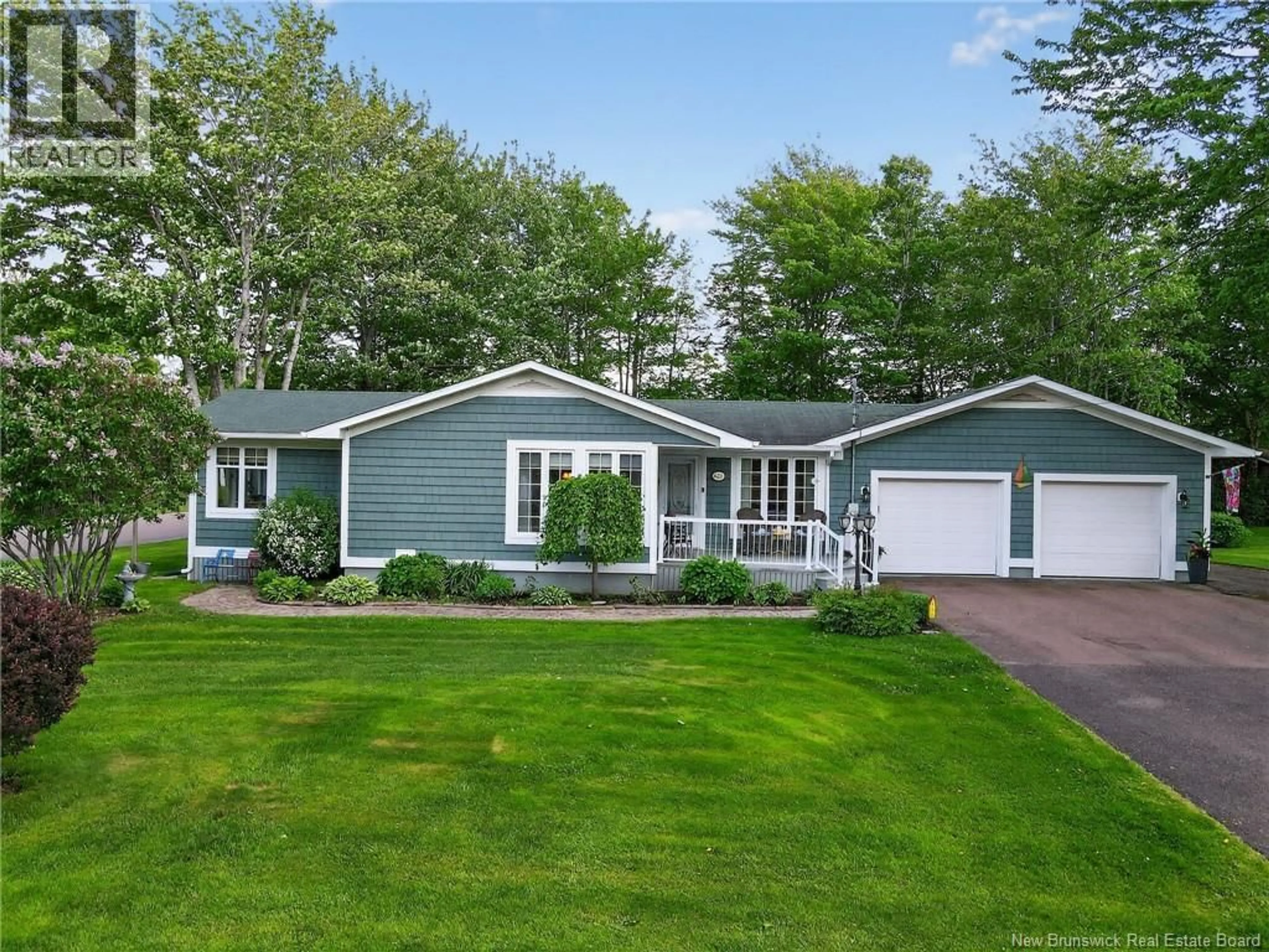 Home with vinyl exterior material, street for 451 BREAUX BRIDGE, Shediac New Brunswick E4P2M5