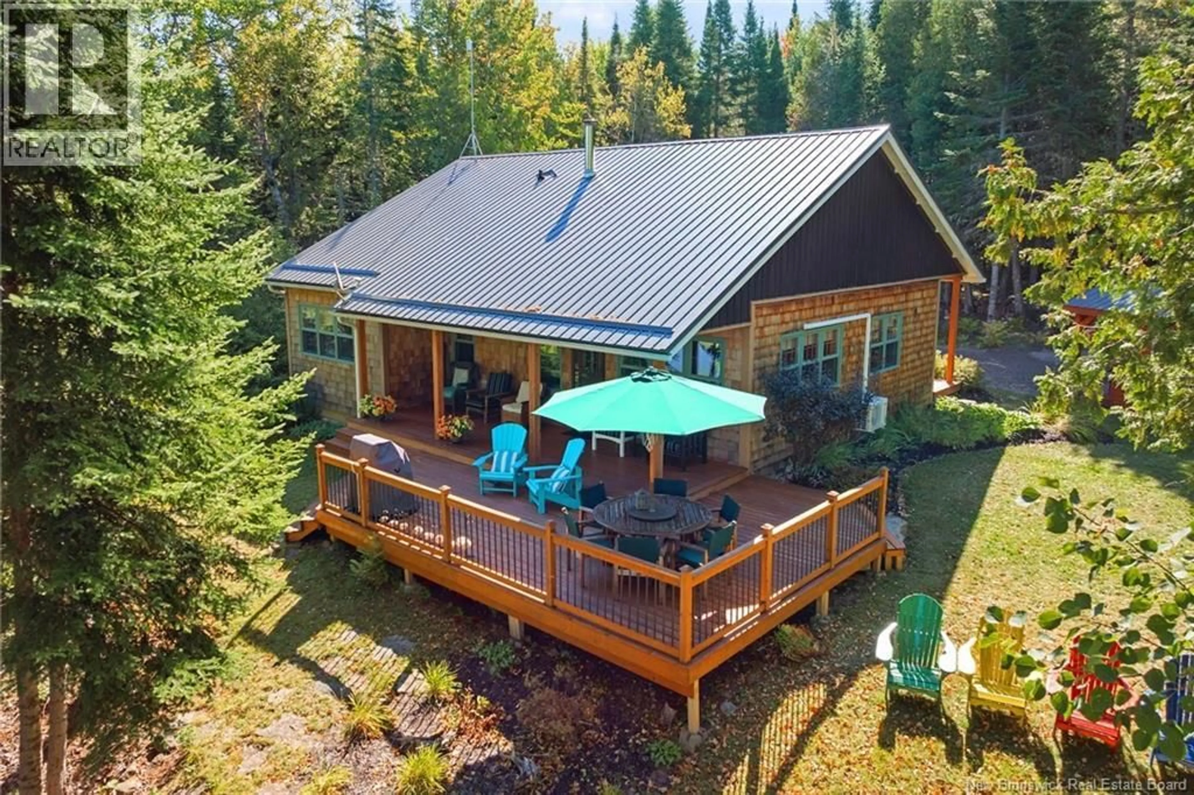 A pic from outside/outdoor area/front of a property/back of a property/a pic from drone, water/lake/river/ocean view for 27 THOMAS LANE, Long Creek New Brunswick E4C4S9