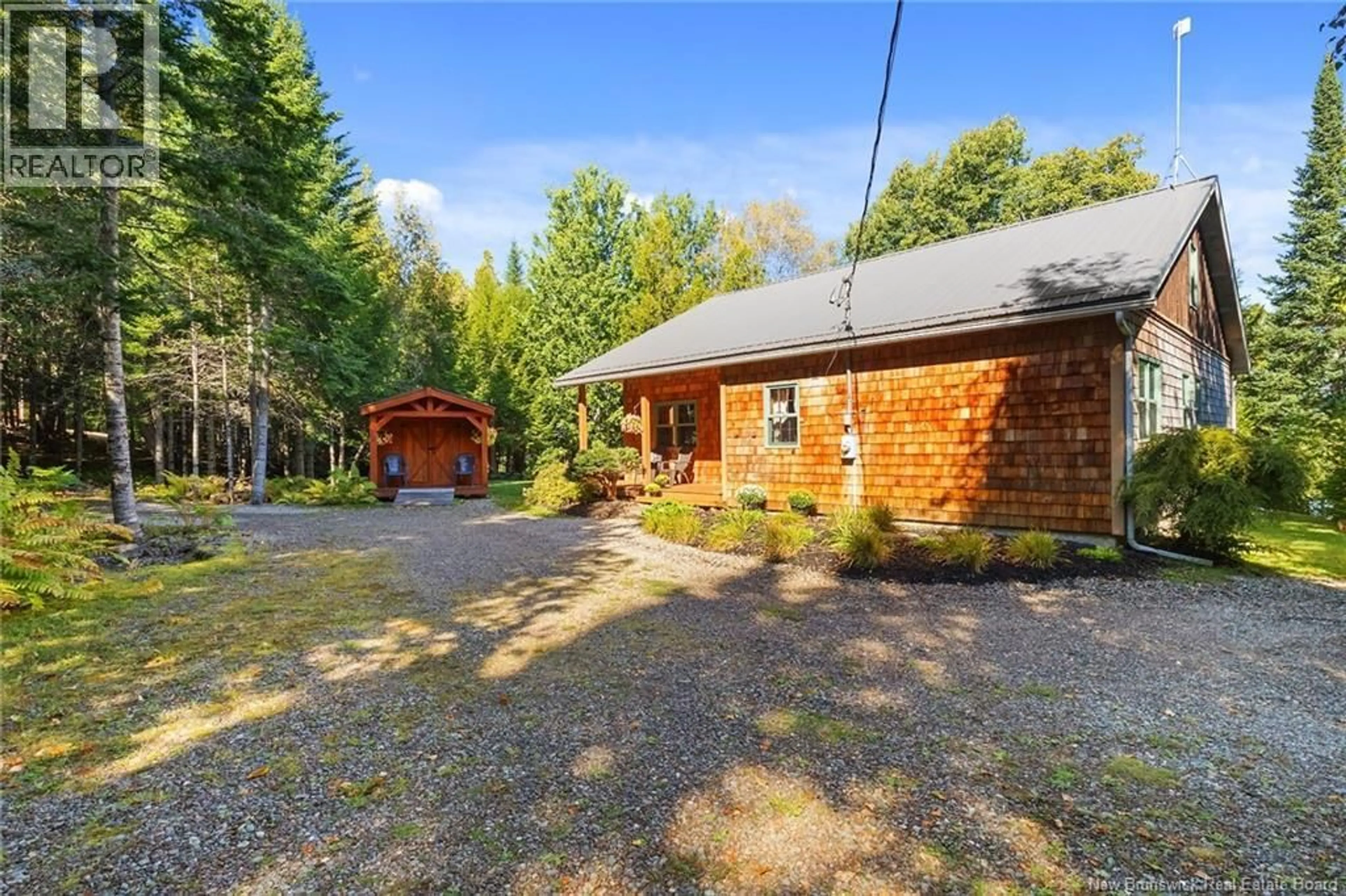 A pic from outside/outdoor area/front of a property/back of a property/a pic from drone, unknown for 27 THOMAS LANE, Long Creek New Brunswick E4C4S9