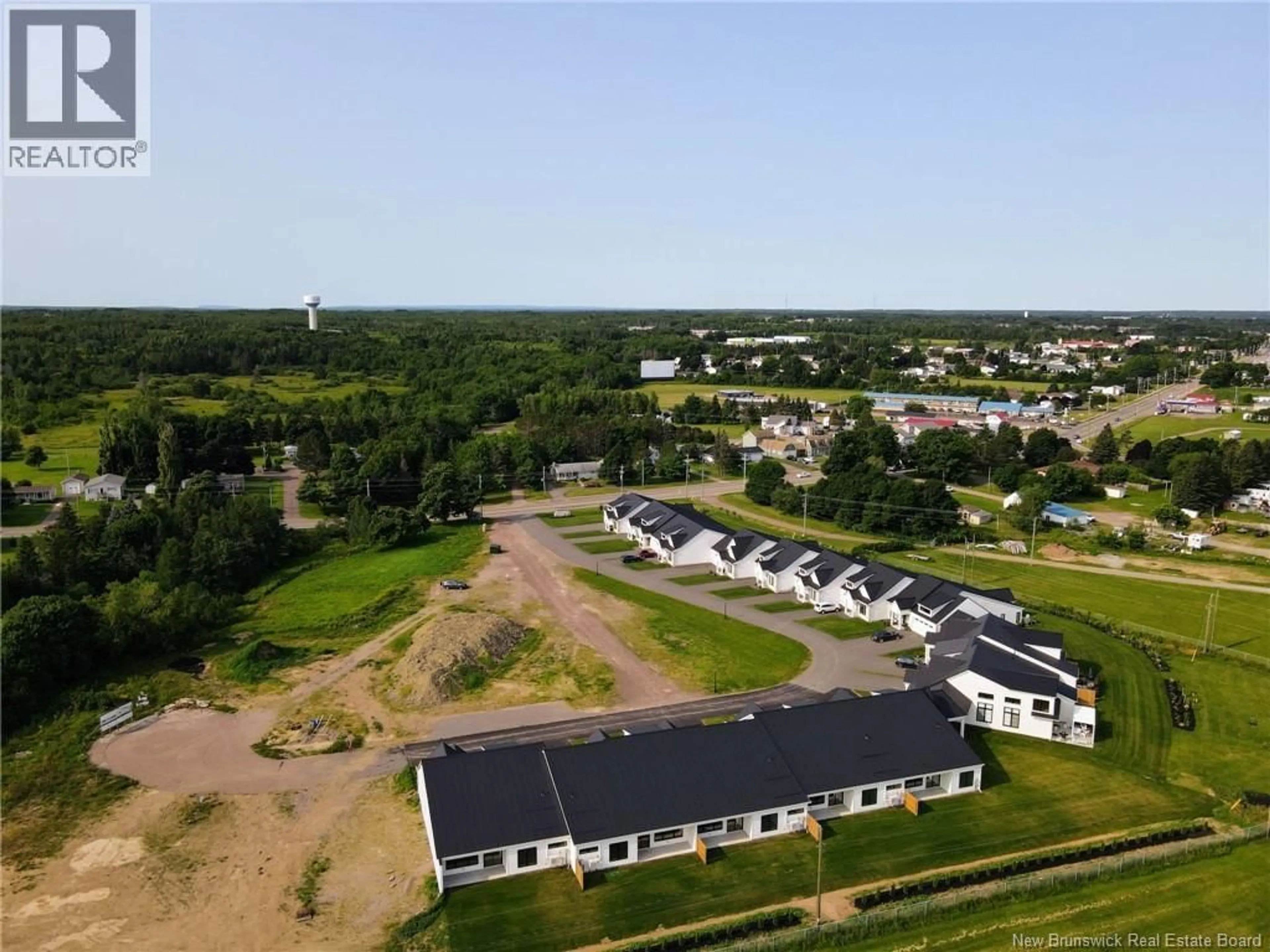 A pic from outside/outdoor area/front of a property/back of a property/a pic from drone, unknown for 114 - 724 ROUTE 133, Shediac New Brunswick E4P5A3