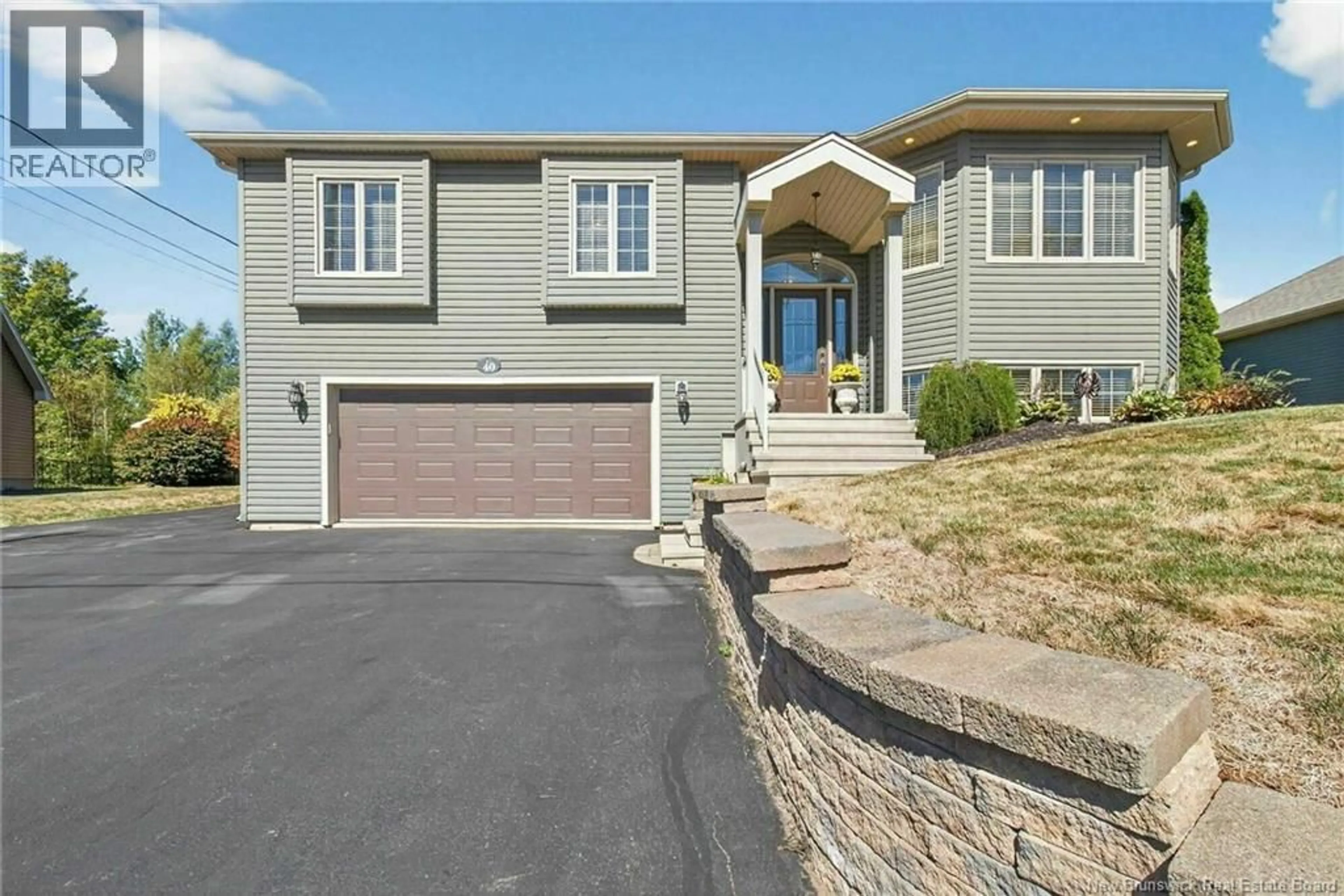 Home with brick exterior material, street for 40 EUGENE COURT, Dieppe New Brunswick E1A0P2