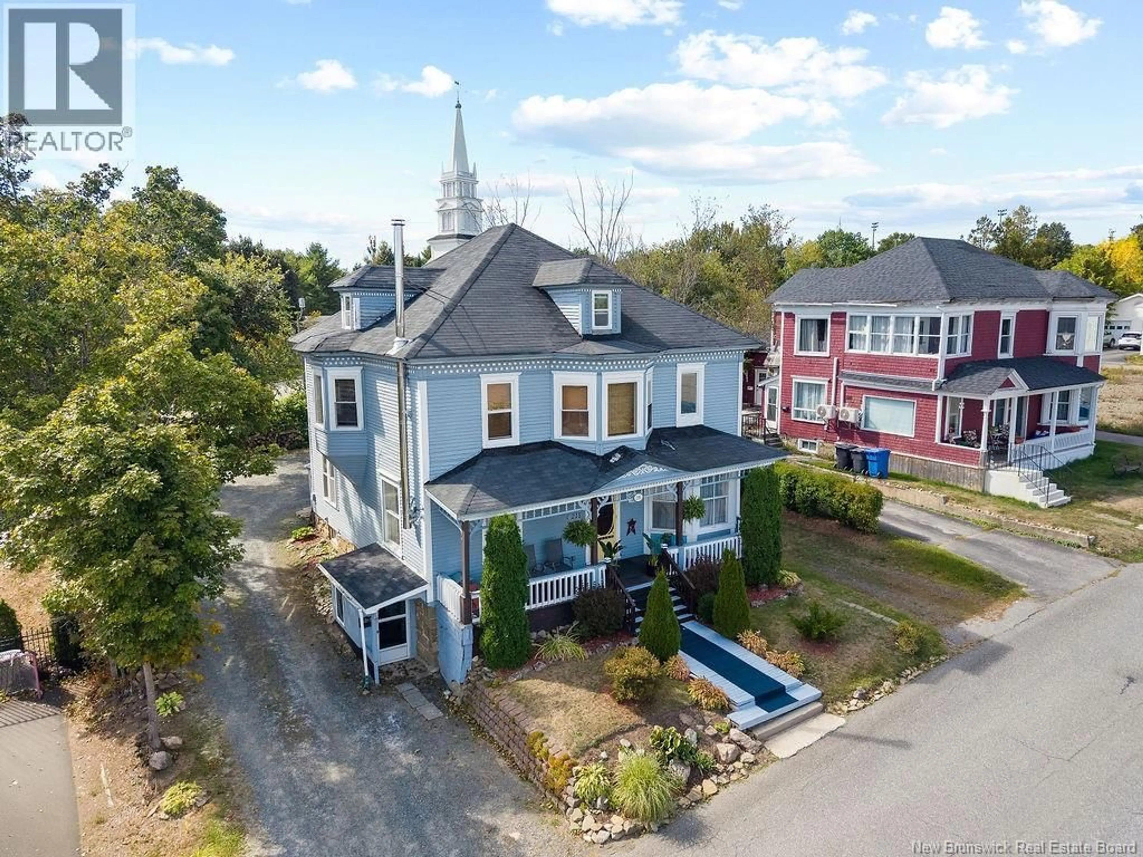 A pic from outside/outdoor area/front of a property/back of a property/a pic from drone, street for 215 REGENT STREET, Miramichi New Brunswick E1V2M9