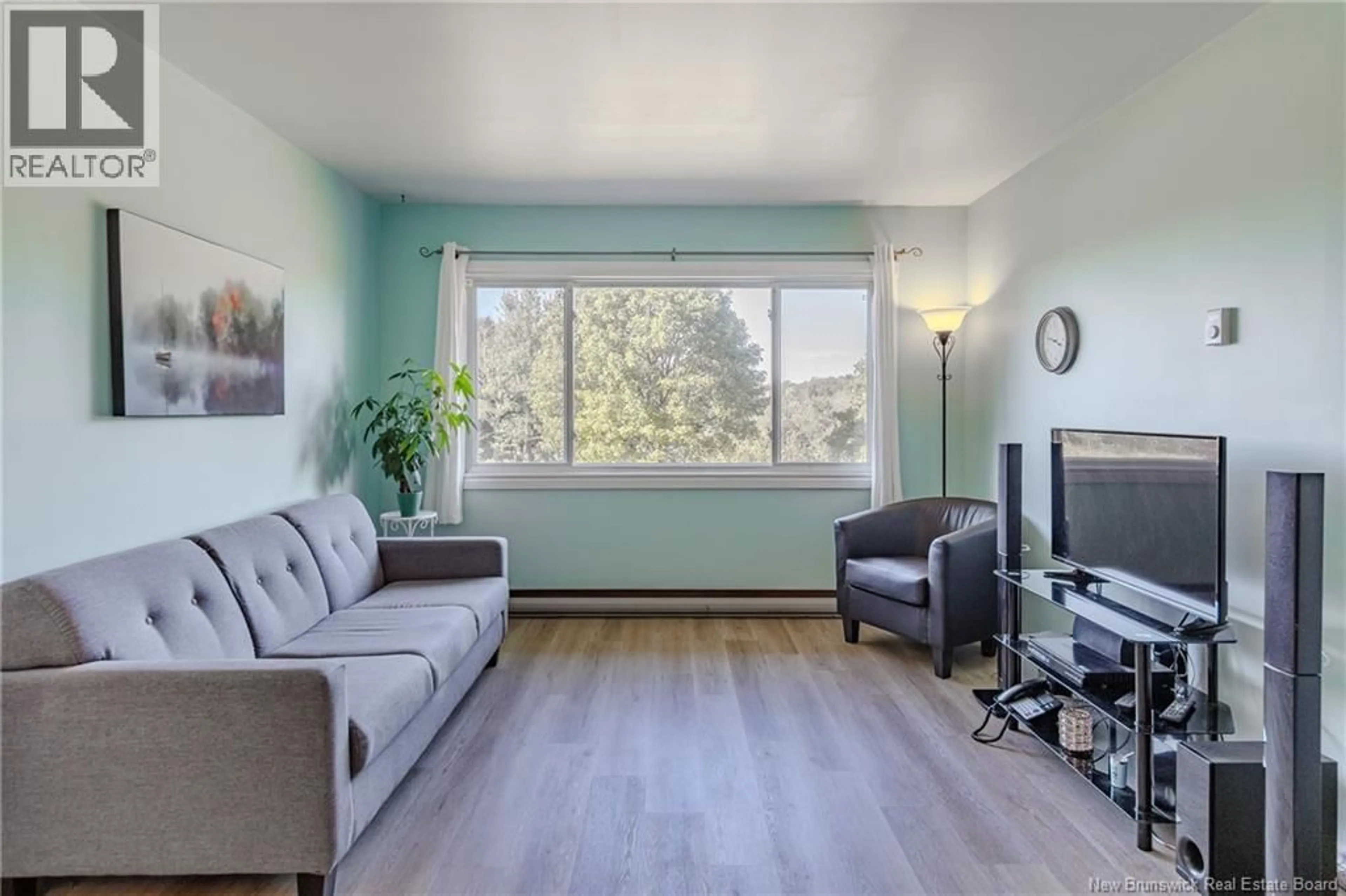 Living room with furniture, wood/laminate floor for 7 - 120 MYSTERY LAKE DRIVE, Saint John New Brunswick E2J3Z5