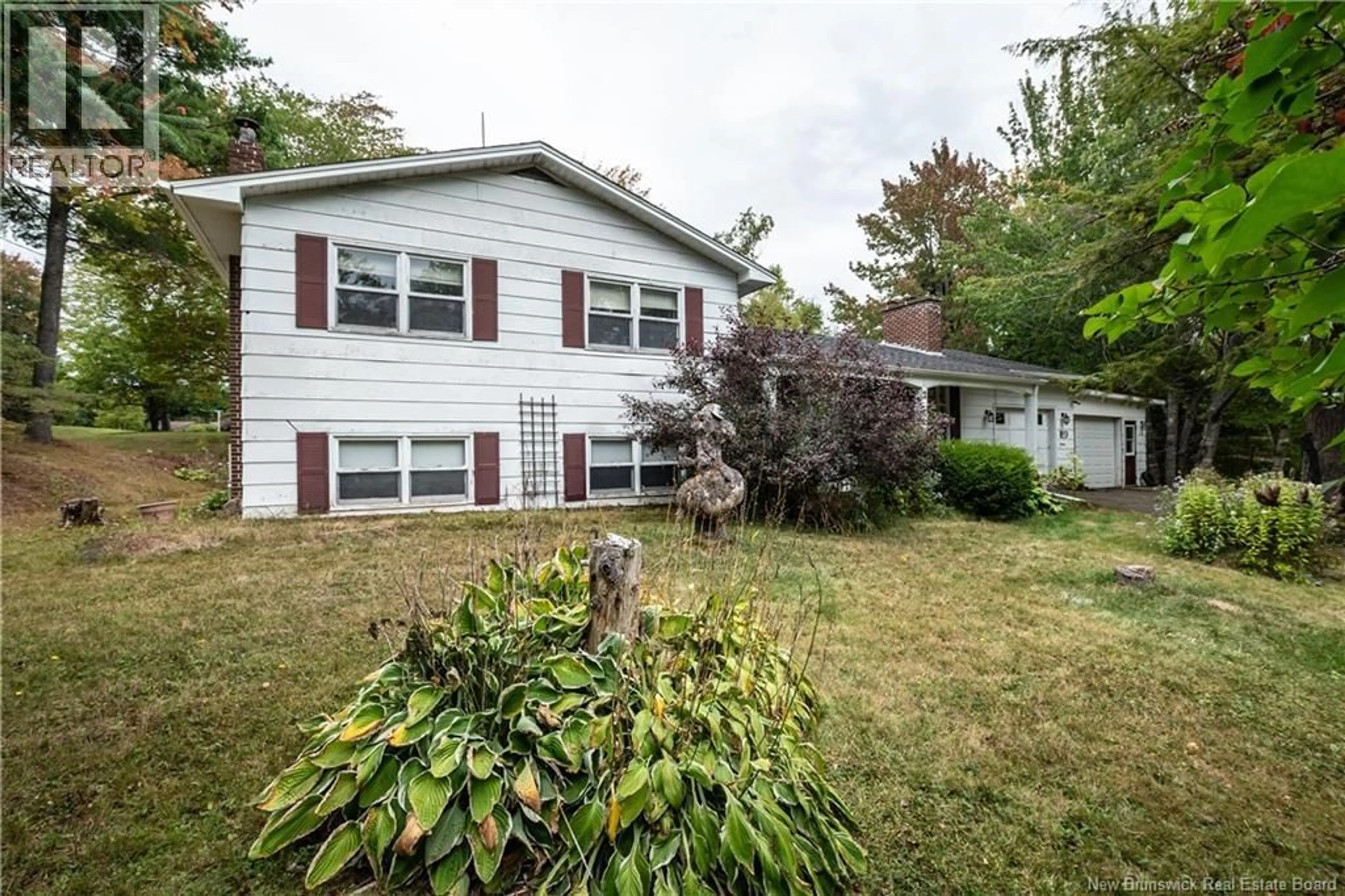 Home with vinyl exterior material, street for 90 MARCOMBE, Lower Coverdale New Brunswick E1J1K1