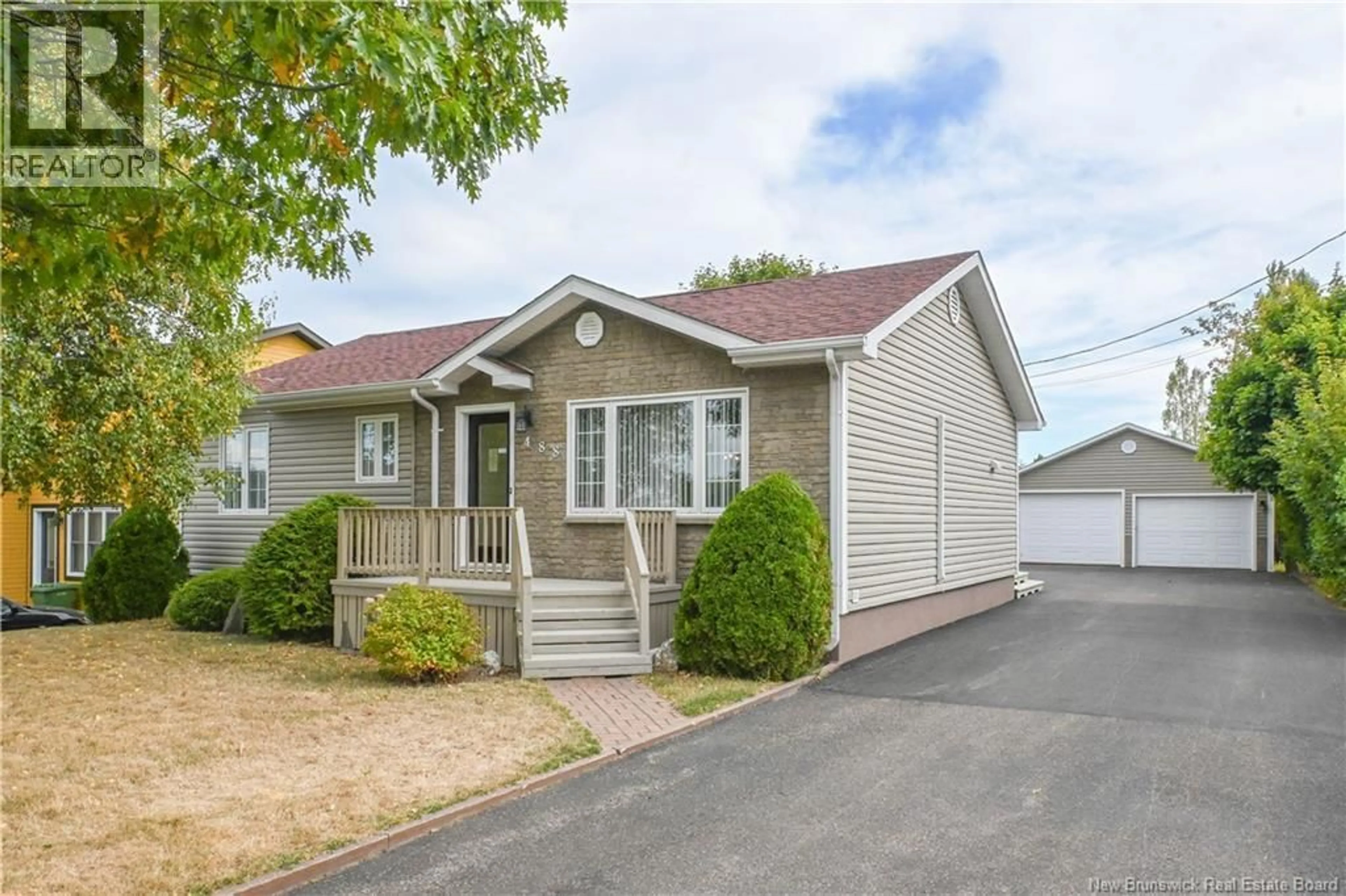 Home with vinyl exterior material, street for 488 GEORGES O STREET, Tracadie New Brunswick E1X1A7