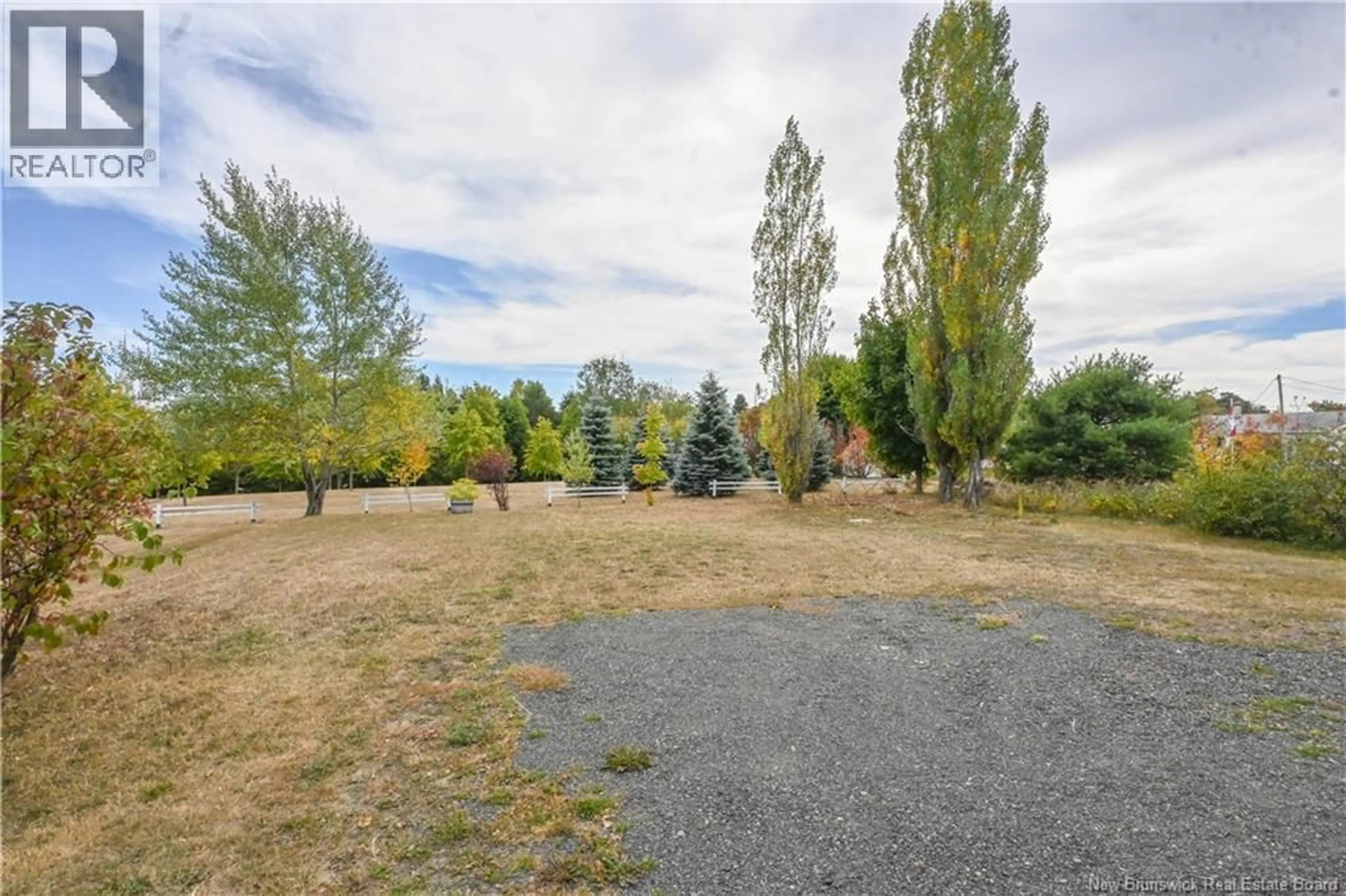 A pic from outside/outdoor area/front of a property/back of a property/a pic from drone, unknown for 488 GEORGES O STREET, Tracadie New Brunswick E1X1A7