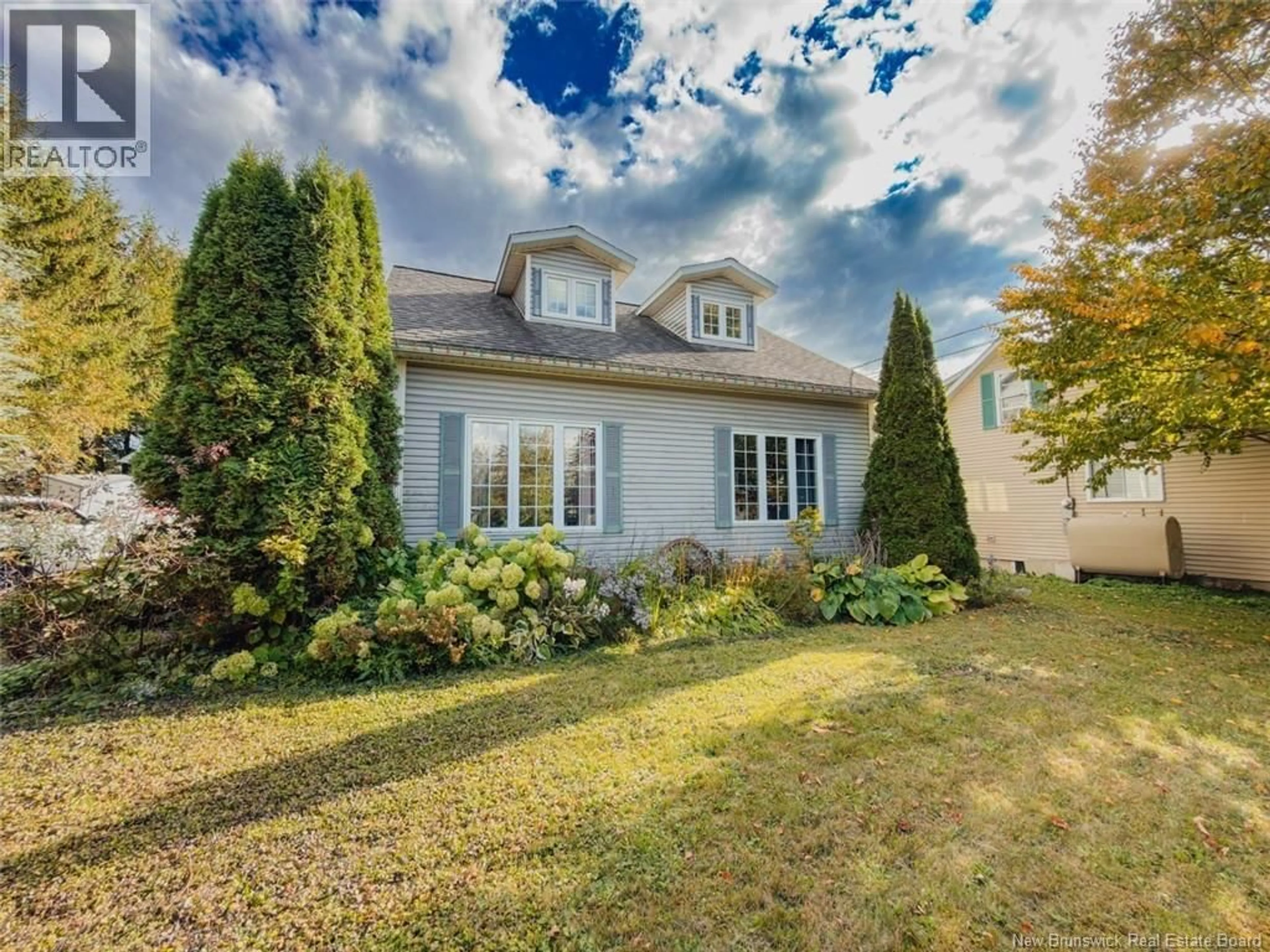 Home with vinyl exterior material, street for 62 HILLCREST AVENUE, Hartland New Brunswick E7P1M7