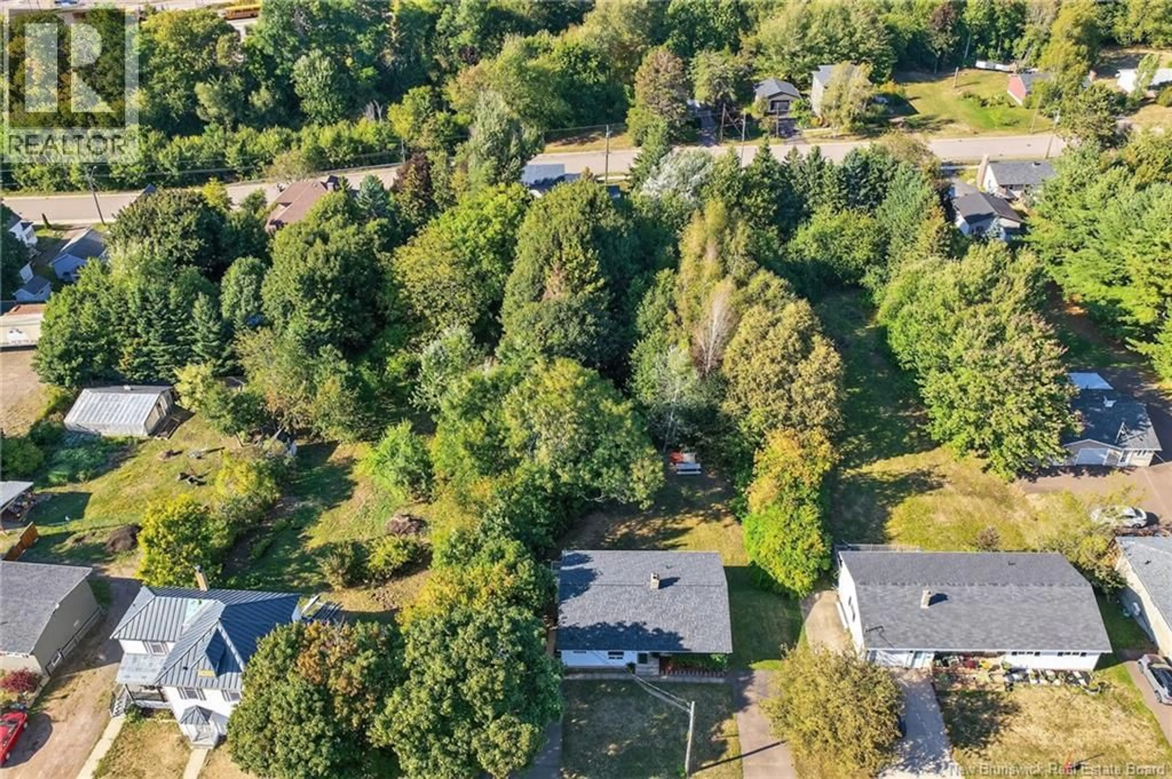 A pic from outside/outdoor area/front of a property/back of a property/a pic from drone, street for 64 DRUMMOND STREET, Moncton New Brunswick E1A2Z2
