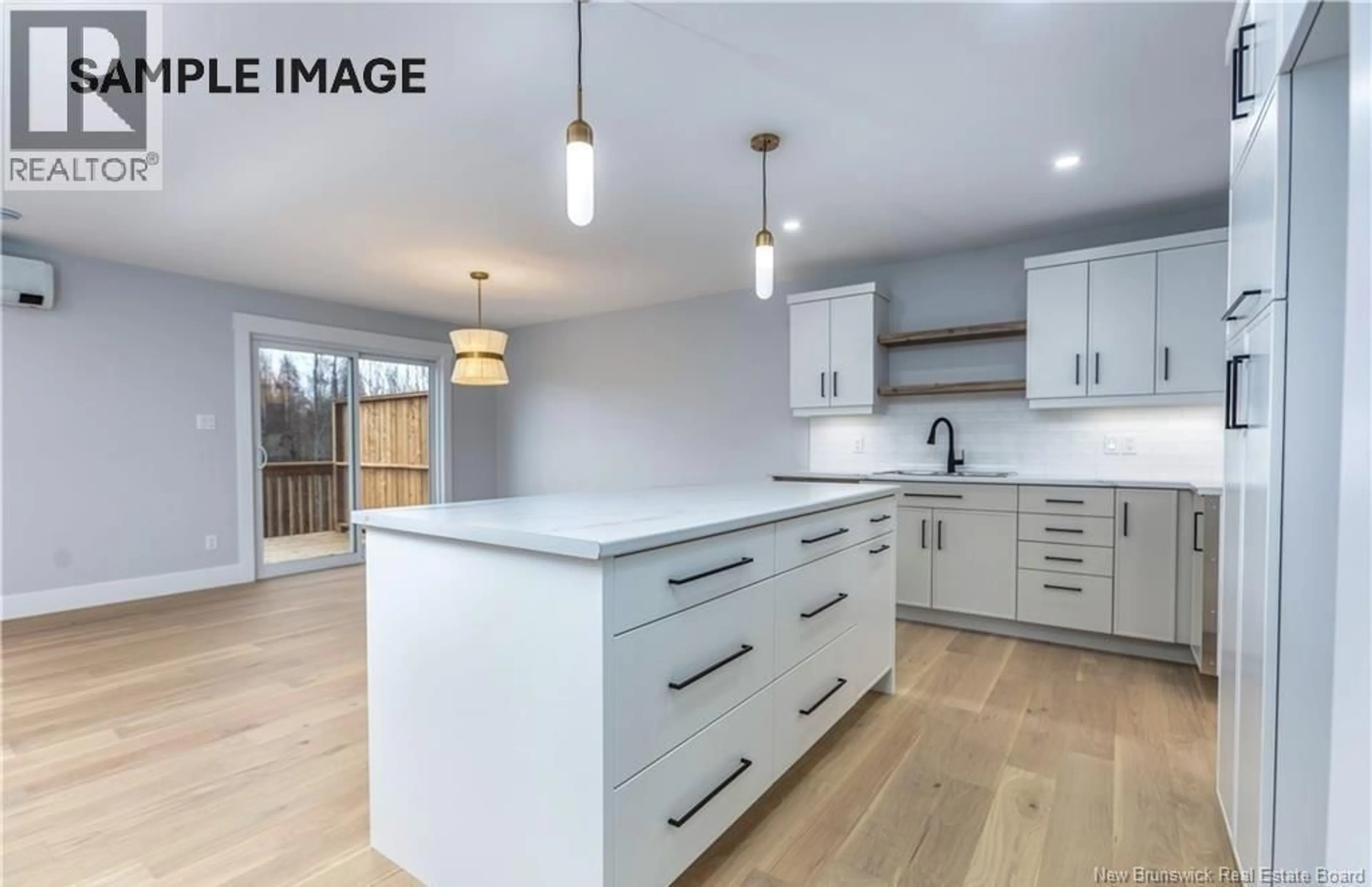 Open concept kitchen, wood/laminate floor for 74 TWIN OAKS DRIVE, Moncton New Brunswick E1G0A1