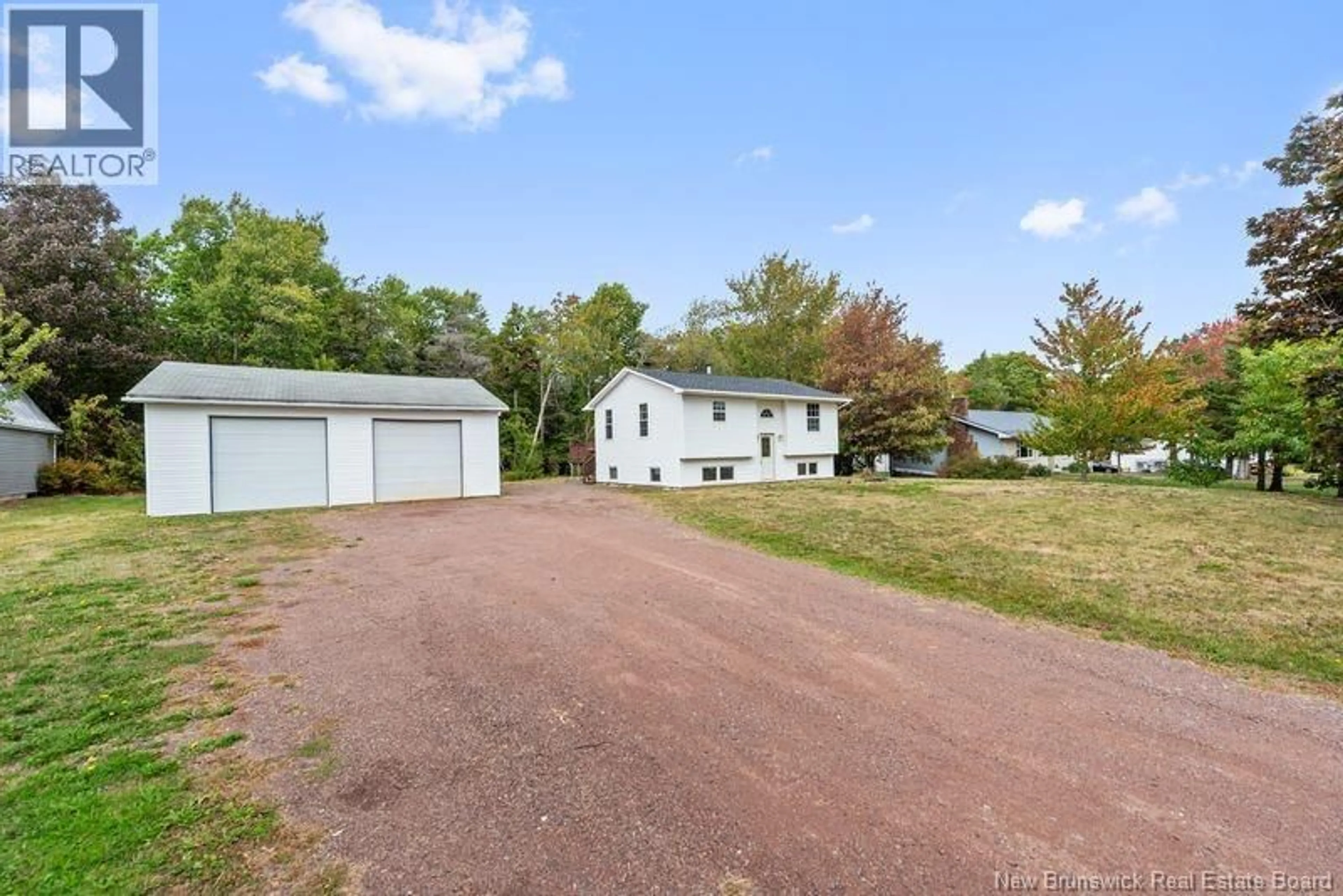 A pic from outside/outdoor area/front of a property/back of a property/a pic from drone, street for 53 COMMUNICATION ROAD, Irishtown New Brunswick E1H2G3