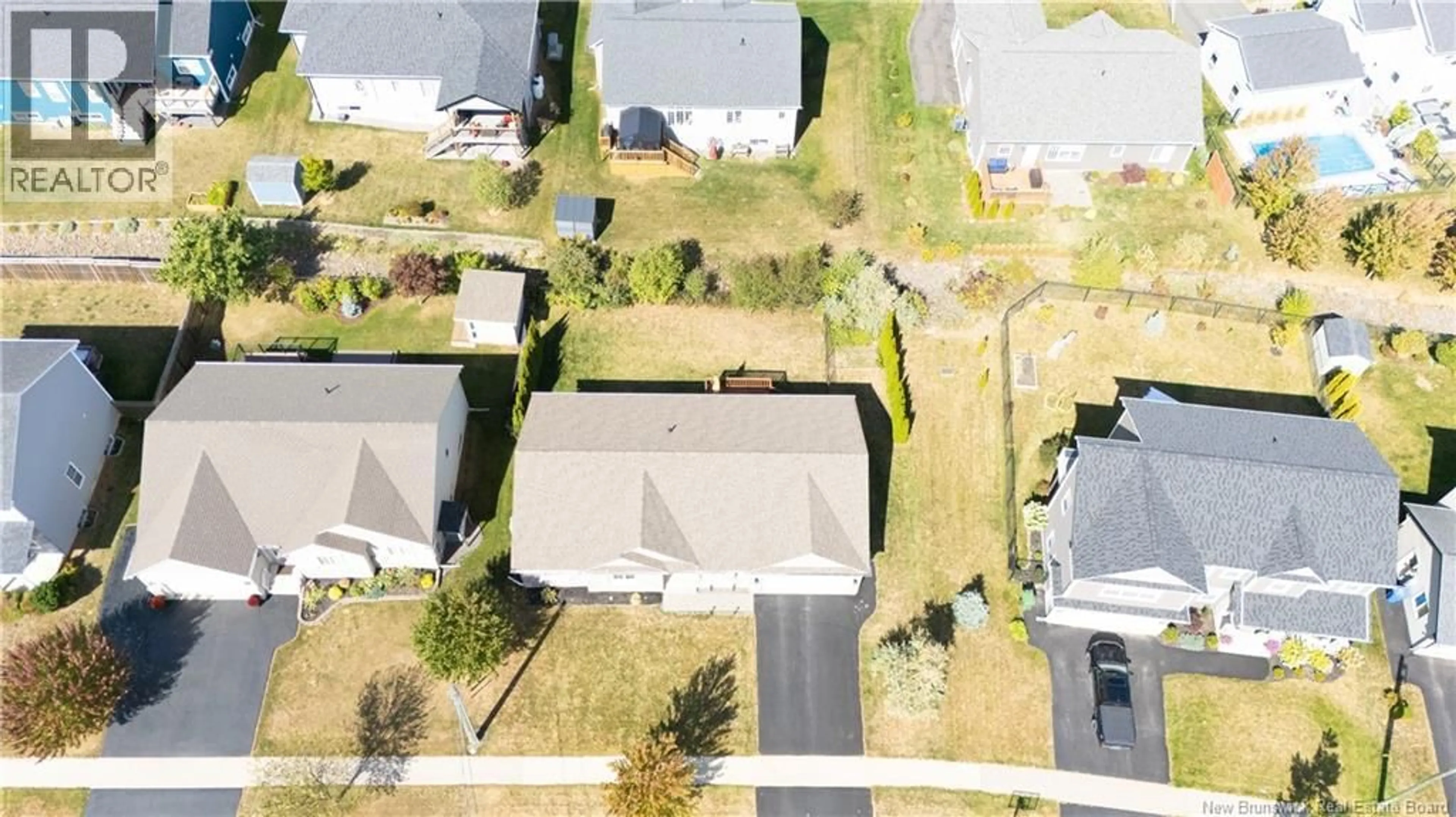 A pic from outside/outdoor area/front of a property/back of a property/a pic from drone, street for 194 MORNING GATE DRIVE, Fredericton New Brunswick E3B0G6