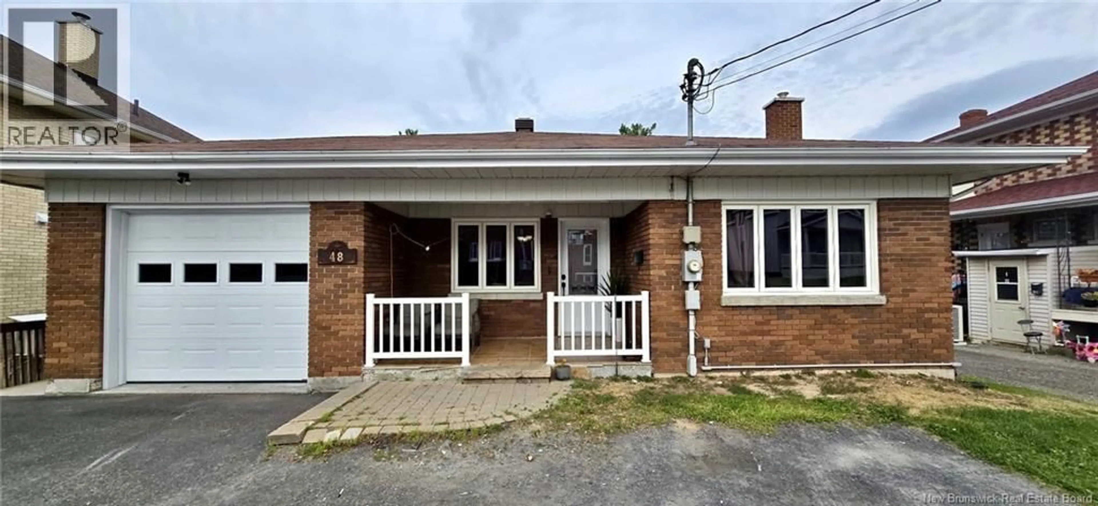 Home with brick exterior material, street for 48 31 IÈME AVENUE, Edmundston New Brunswick E3V2R5