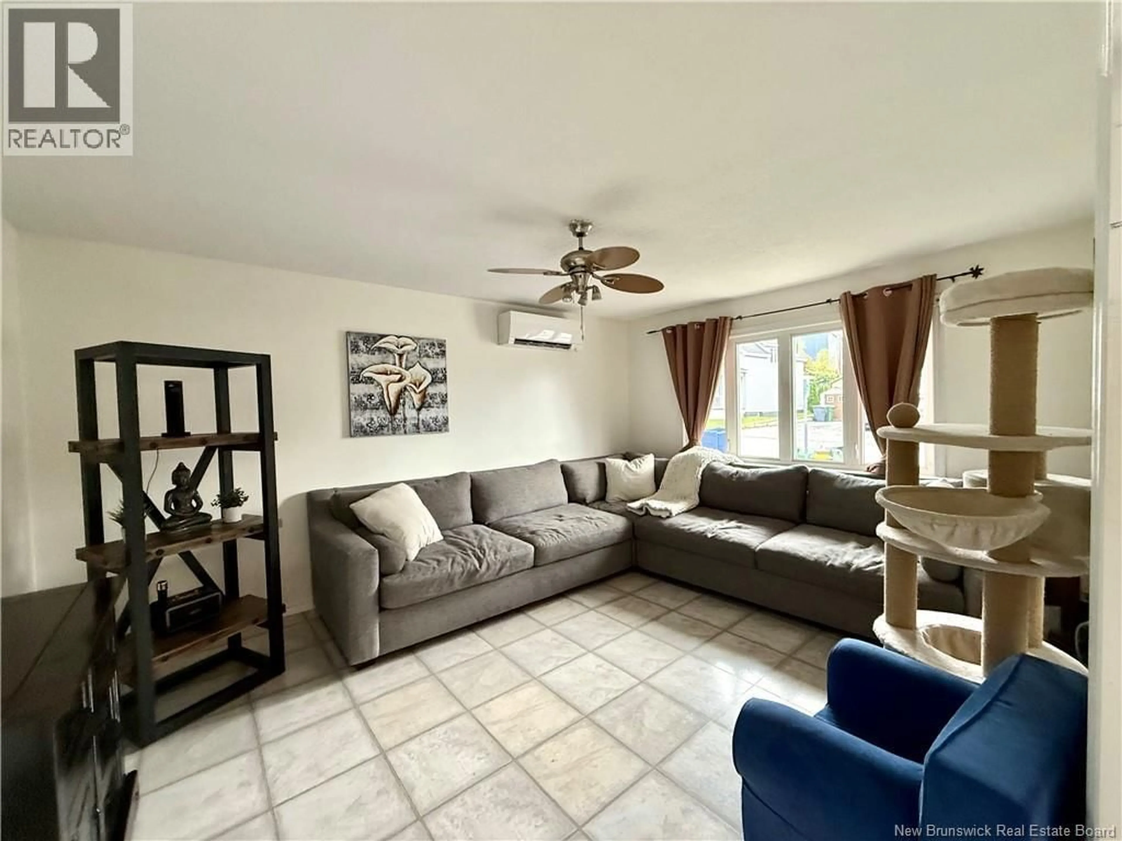 Living room with furniture, ceramic/tile floor for 48 31 IÈME AVENUE, Edmundston New Brunswick E3V2R5