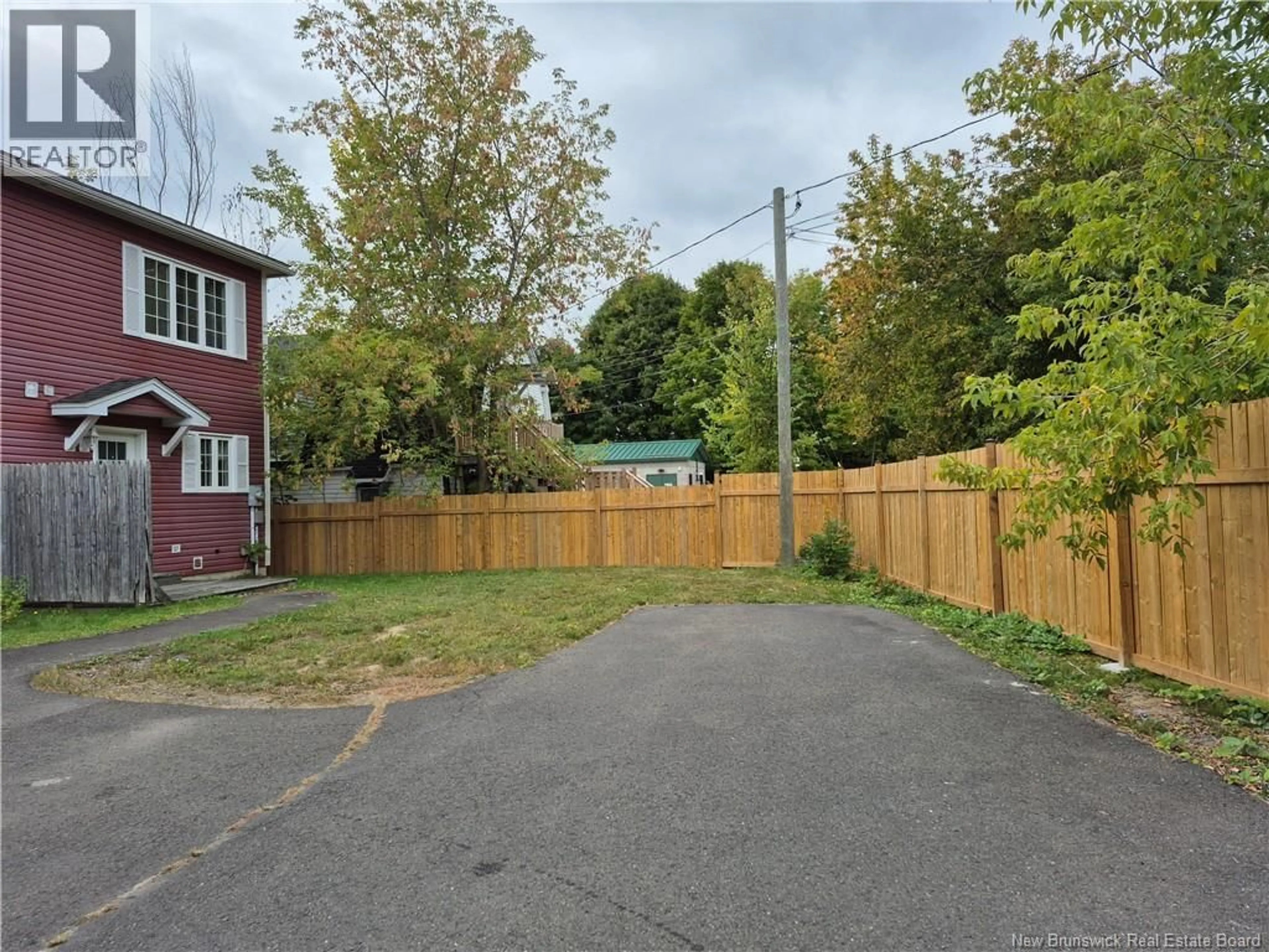 A pic from outside/outdoor area/front of a property/back of a property/a pic from drone, street for 15 CANADA STREET, Marysville New Brunswick E3A3Z1