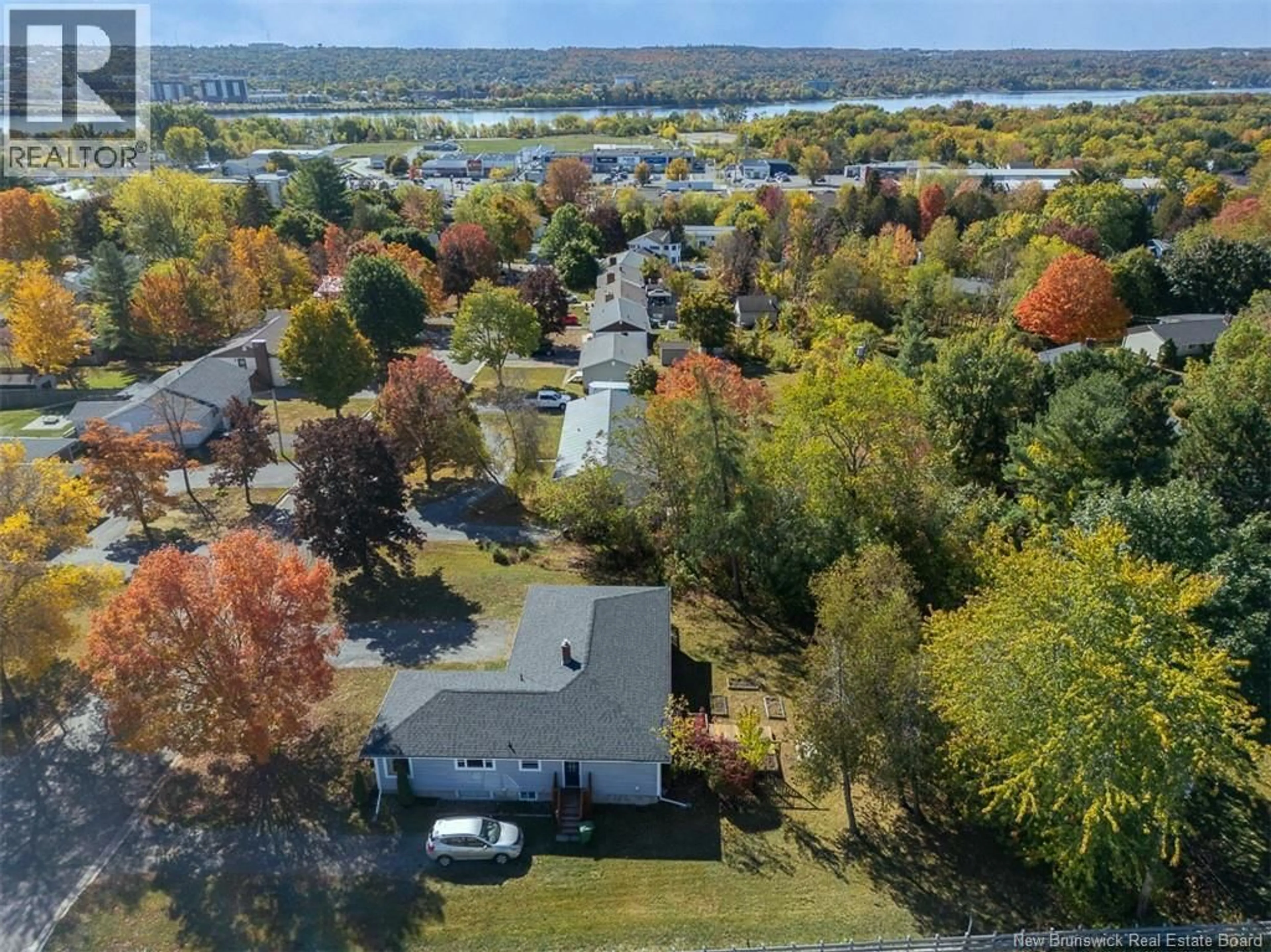 A pic from outside/outdoor area/front of a property/back of a property/a pic from drone, water/lake/river/ocean view for 119 MOSS AVENUE, Fredericton New Brunswick E3A2G2