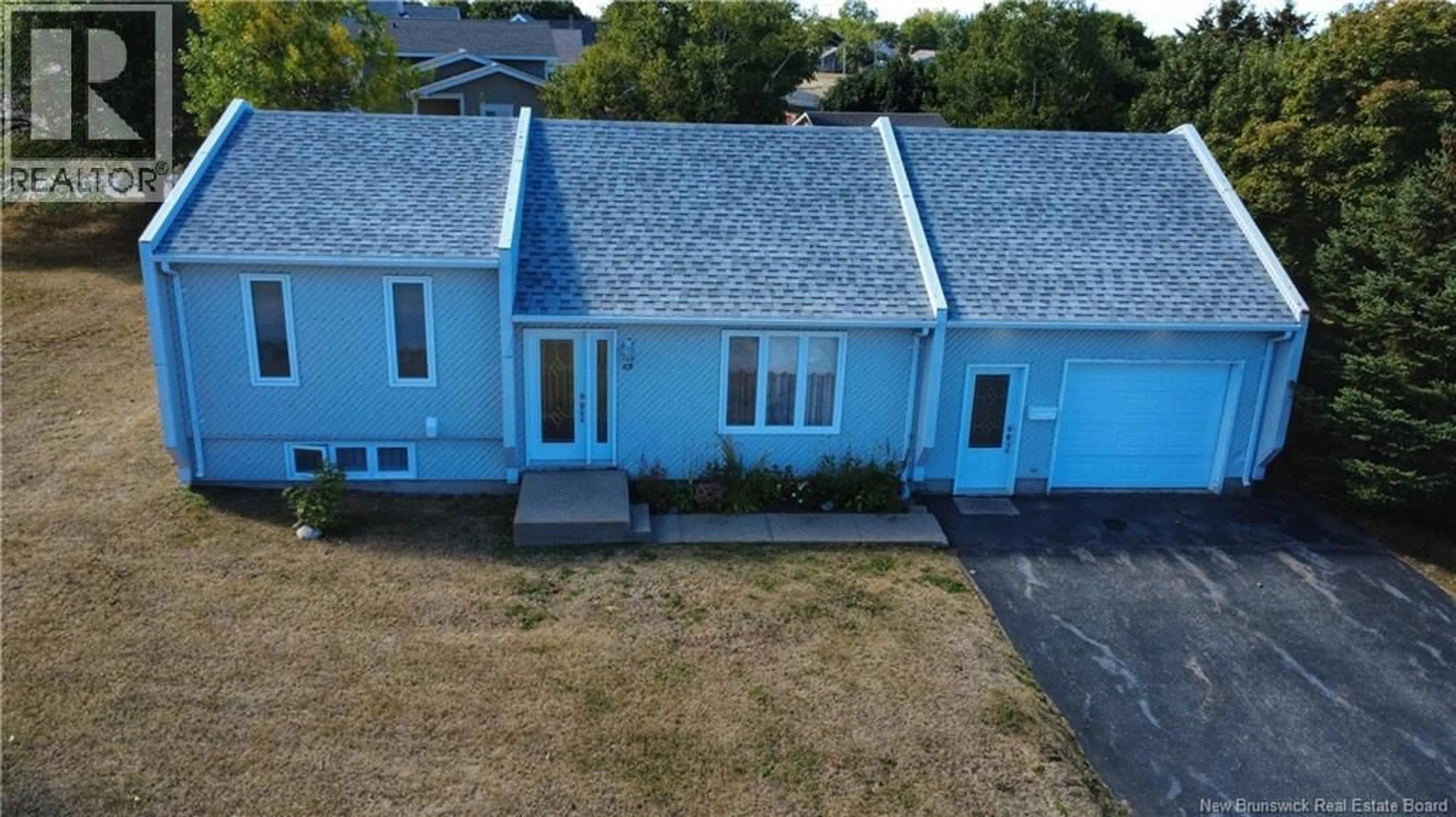 A pic from outside/outdoor area/front of a property/back of a property/a pic from drone, street for 8 RUE BOURGEOIS, Caraquet New Brunswick E1W1A4