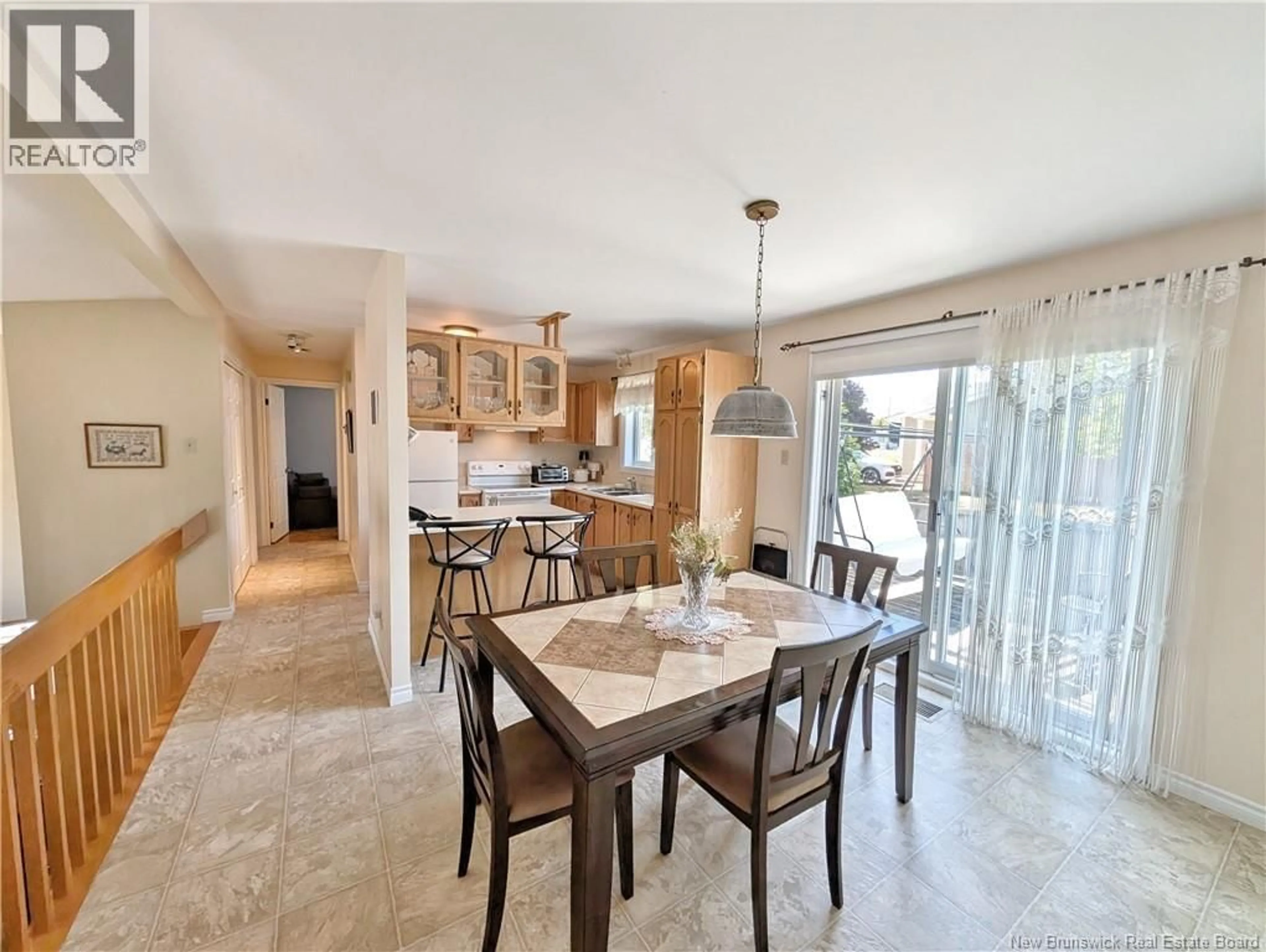 Open concept kitchen, ceramic/tile floor for 8 RUE BOURGEOIS, Caraquet New Brunswick E1W1A4