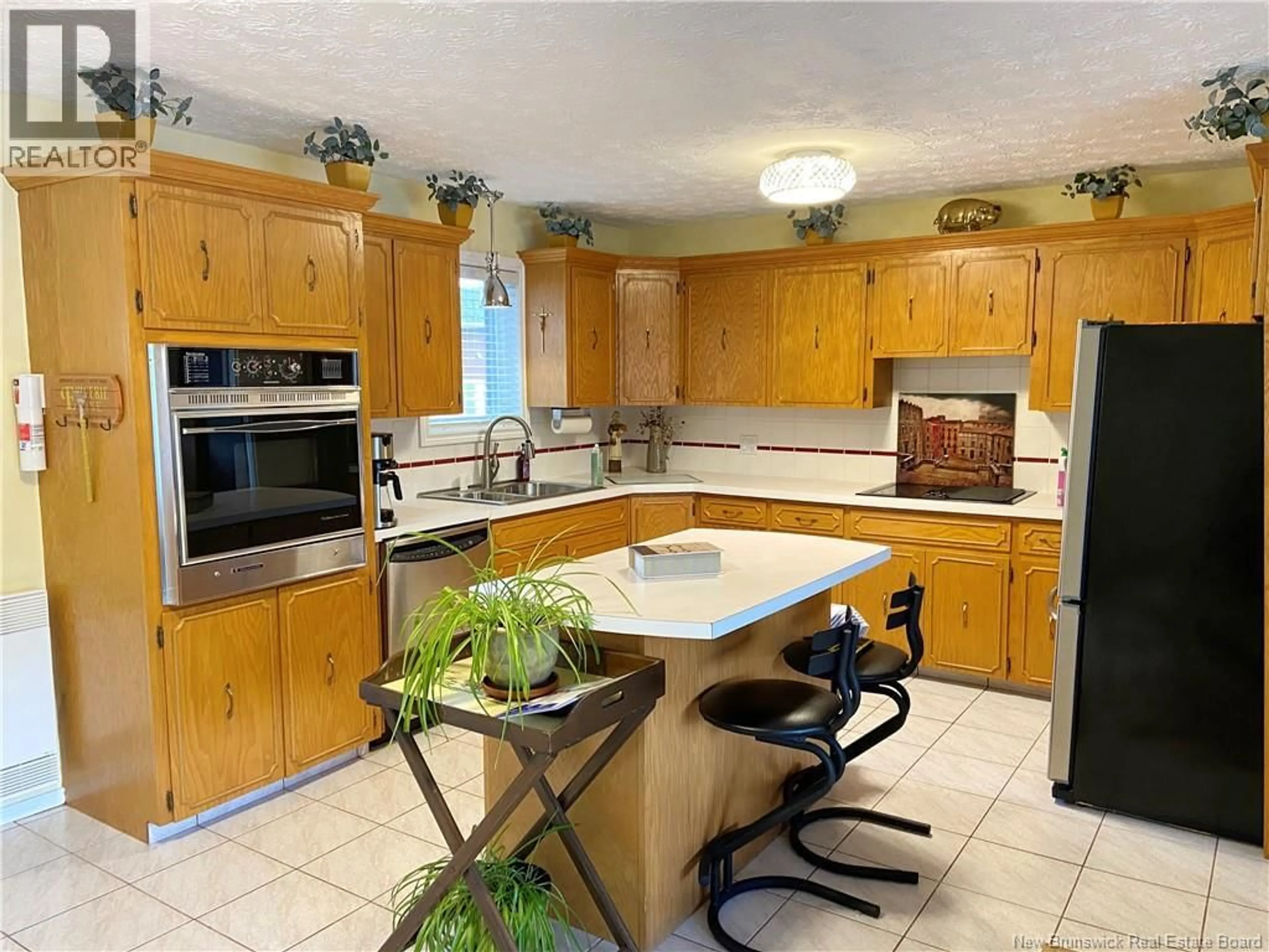 Open concept kitchen, ceramic/tile floor for 374 ISIDORE BOUCHER BOULEVARD, Saint-Jacques New Brunswick E7B1X7