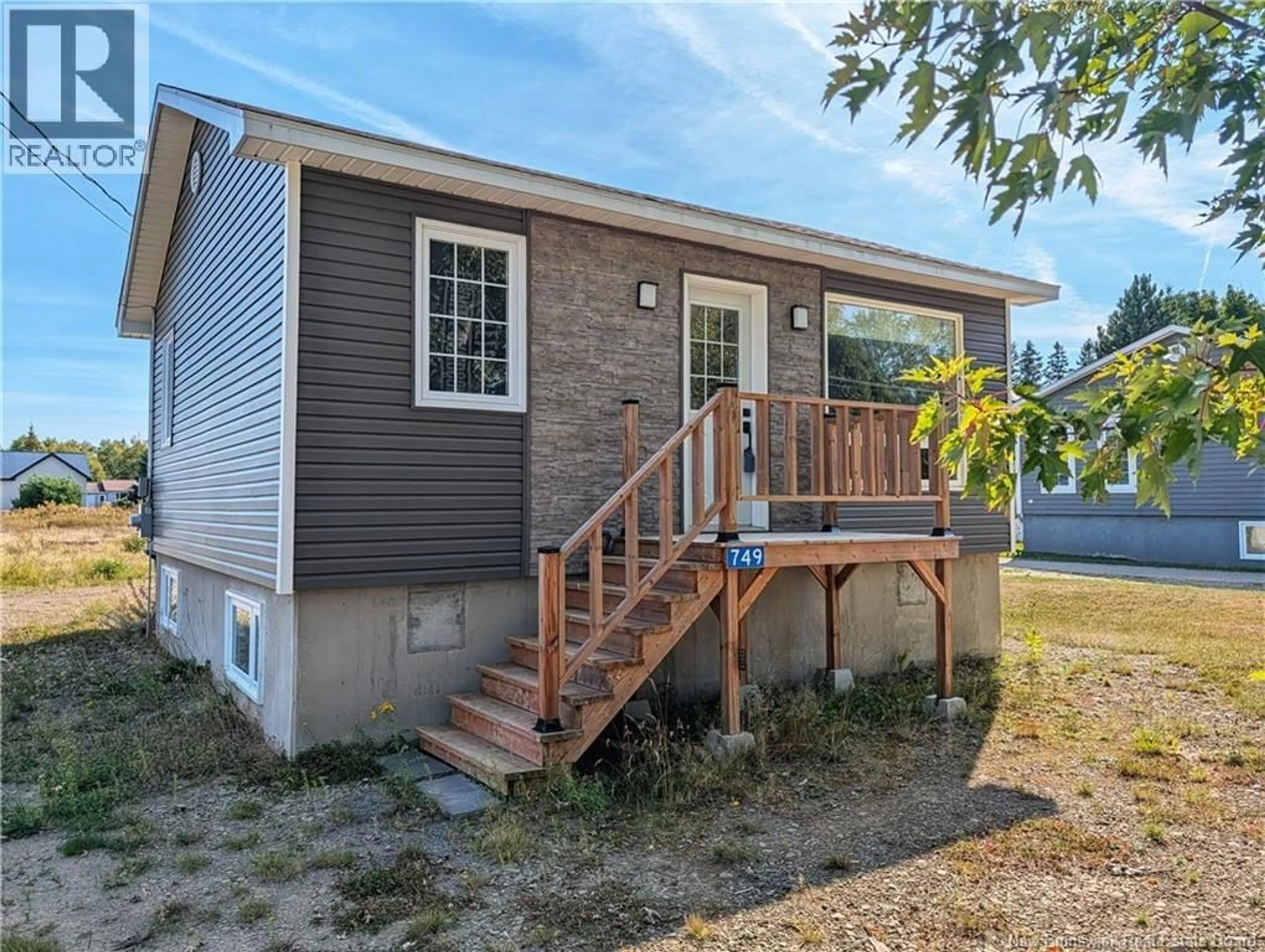 Home with vinyl exterior material, street for 749 SAINT-JOSEPH BOULEVARD, Saint-Léolin New Brunswick E8N2N3