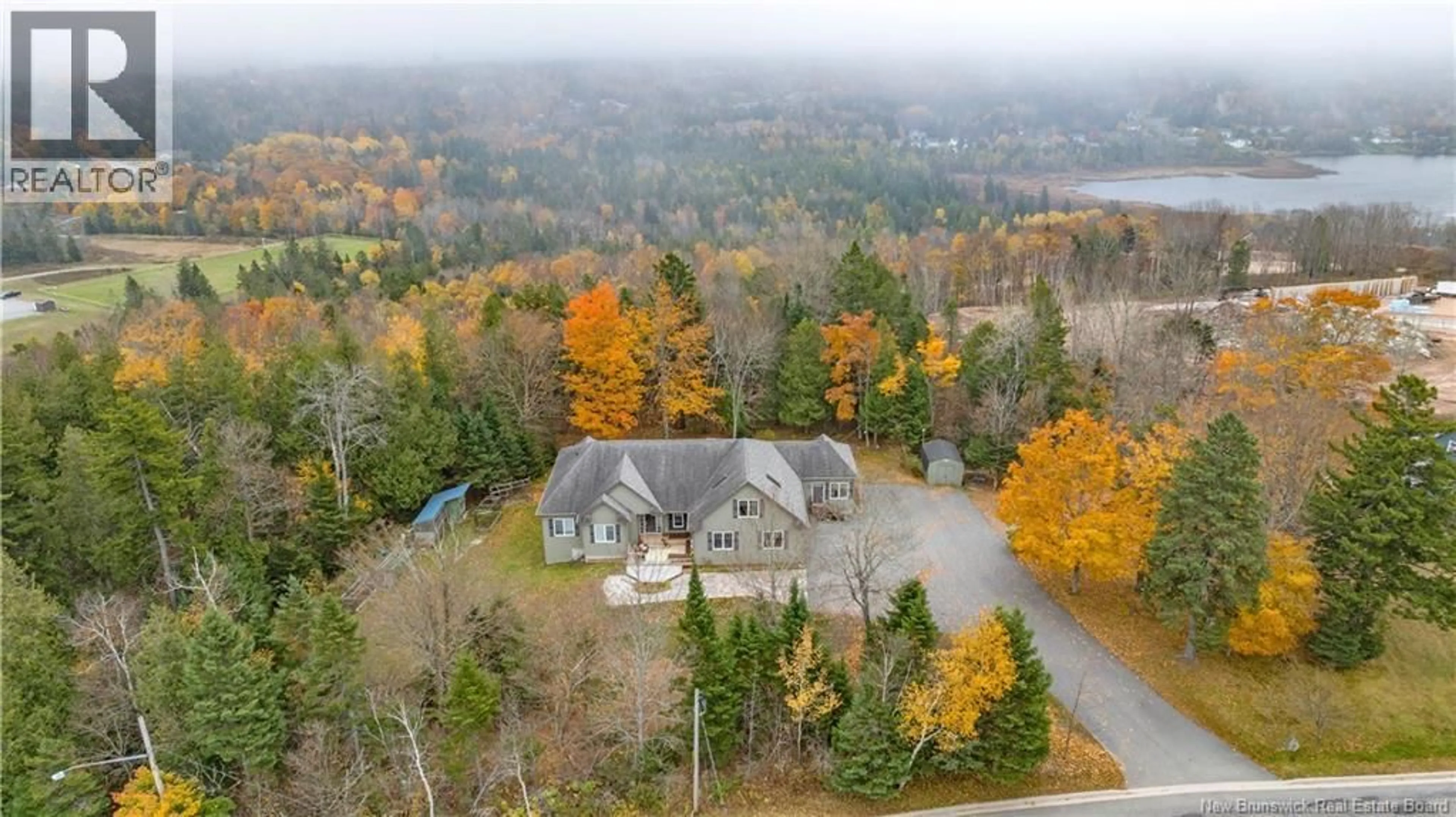 A pic from outside/outdoor area/front of a property/back of a property/a pic from drone, water/lake/river/ocean view for 186 PETTINGILL ROAD, Quispamsis New Brunswick E2E2V6