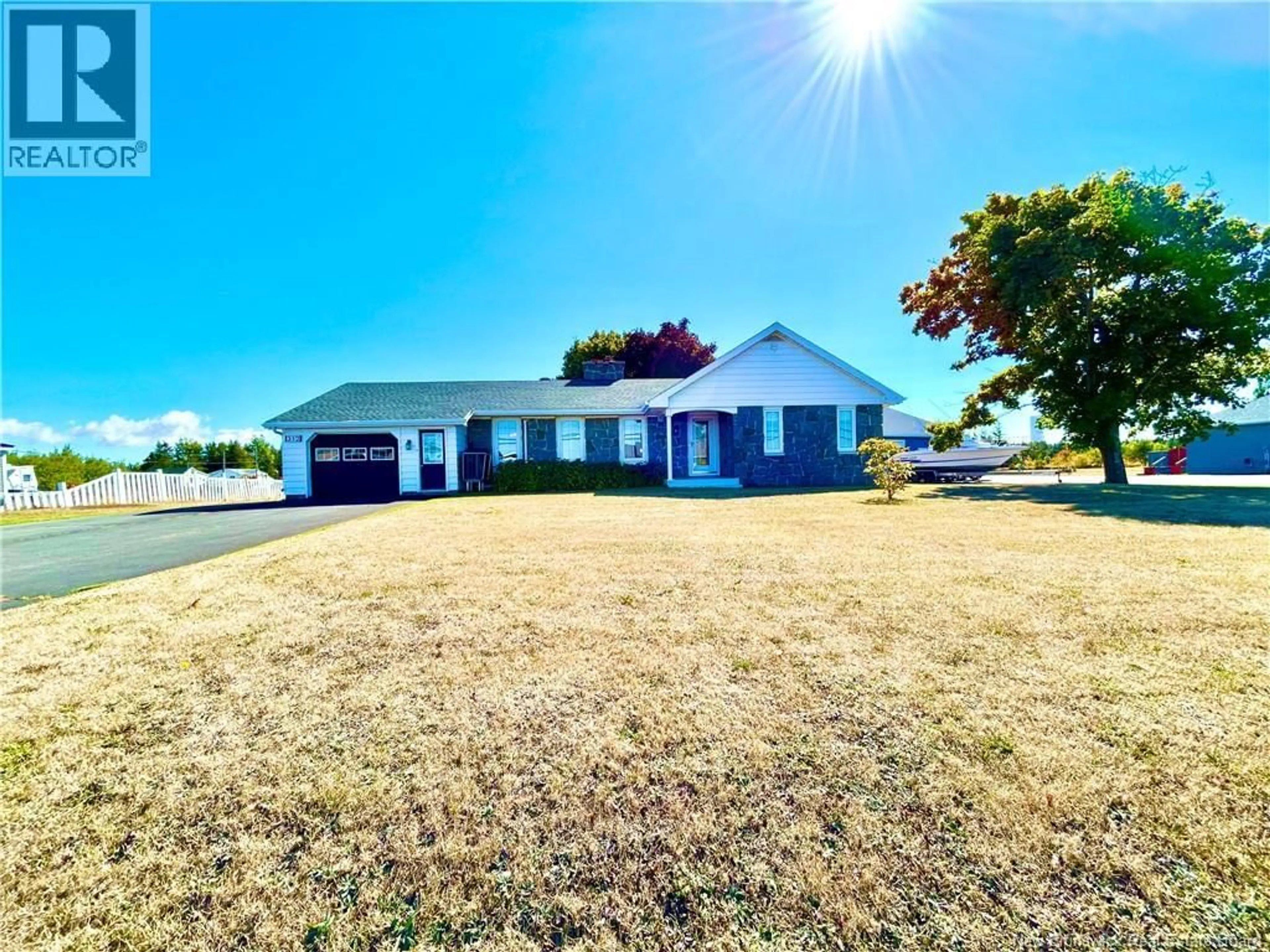 A pic from outside/outdoor area/front of a property/back of a property/a pic from drone, street for 312 ST-PIERRE E BOULEVARD, Caraquet New Brunswick E1W1B4