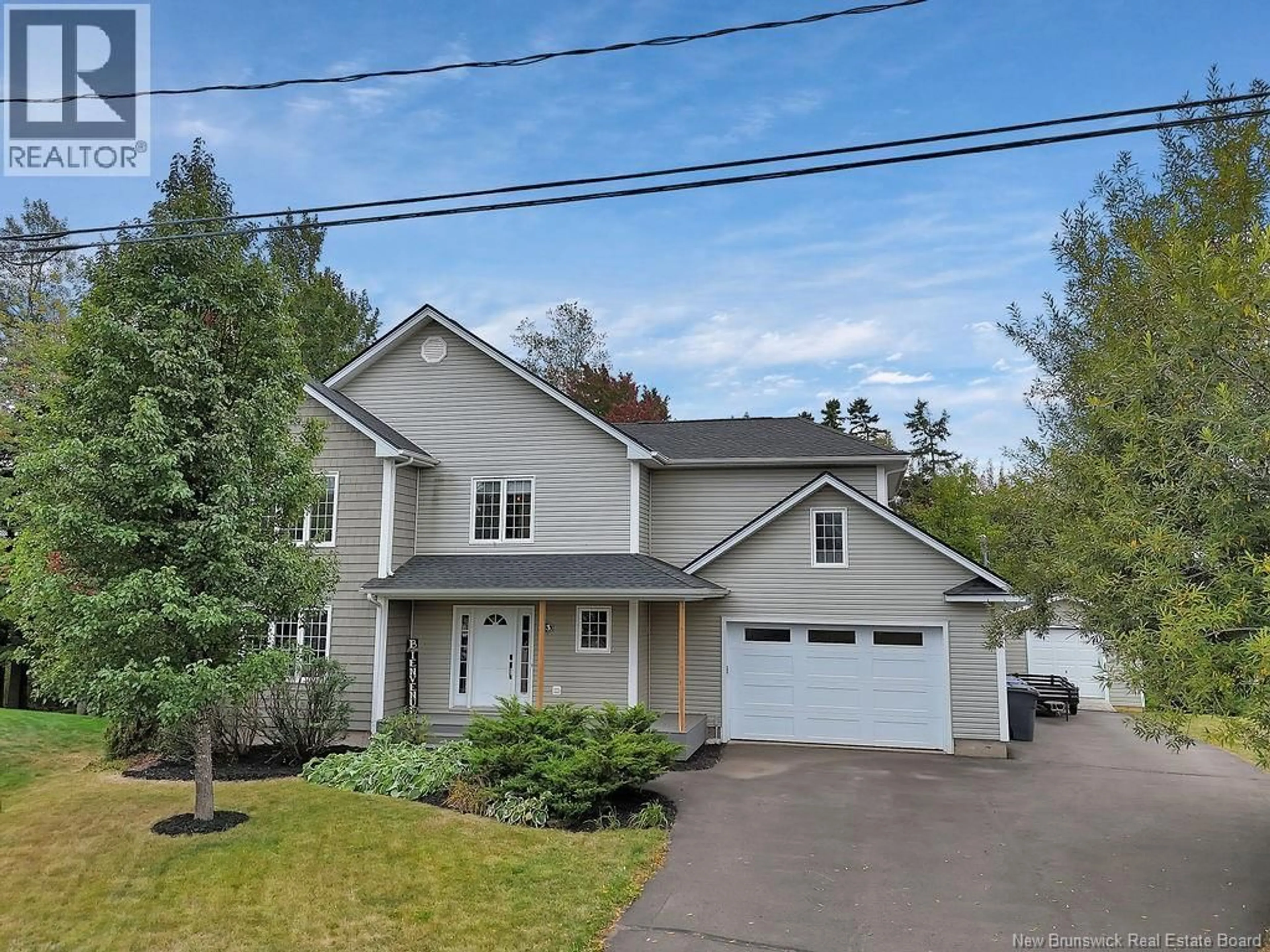 Home with vinyl exterior material, street for 23 DU RUISSEAU STREET, Dieppe New Brunswick E1A7Z8