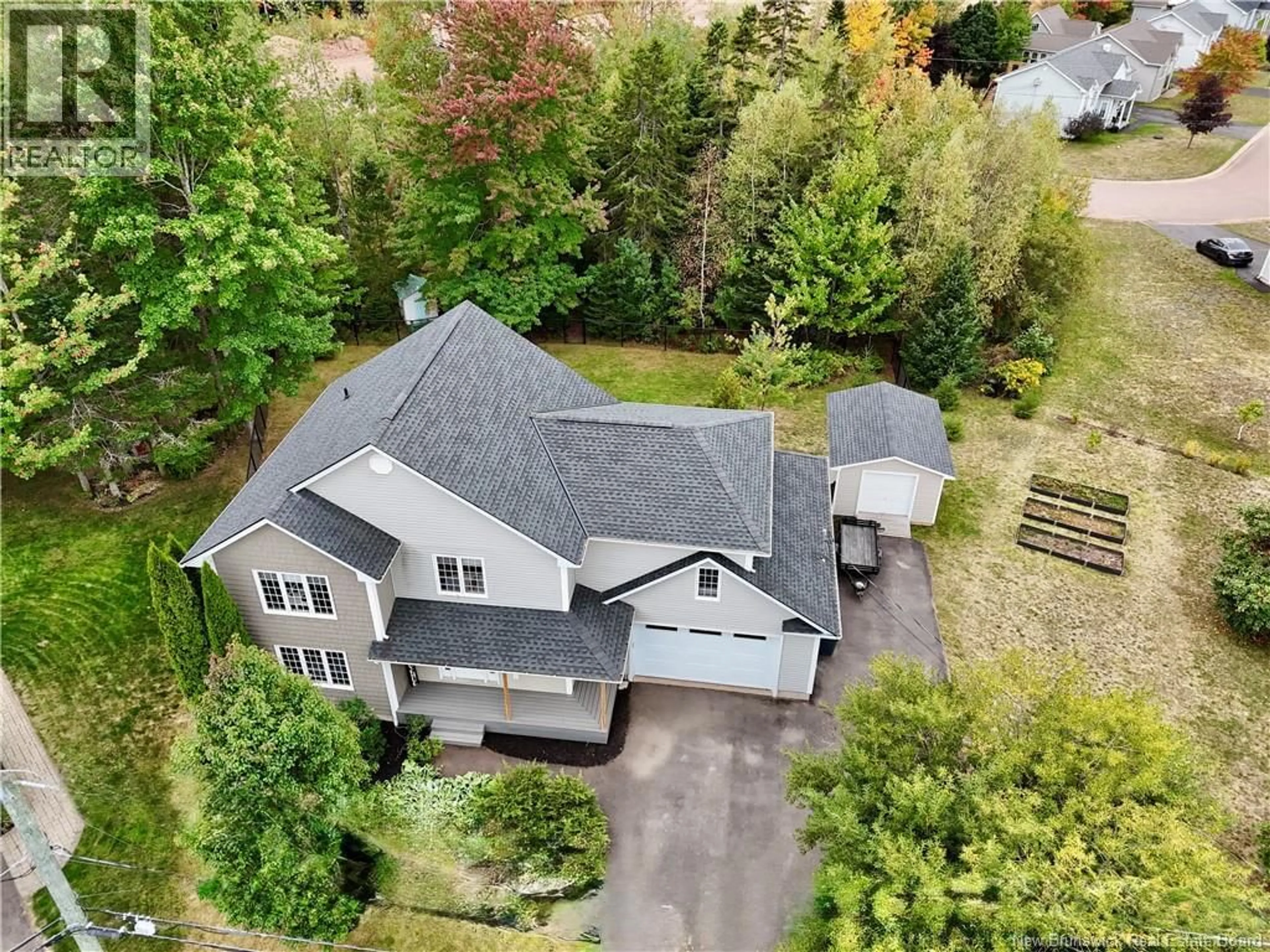A pic from outside/outdoor area/front of a property/back of a property/a pic from drone, street for 23 DU RUISSEAU STREET, Dieppe New Brunswick E1A7Z8