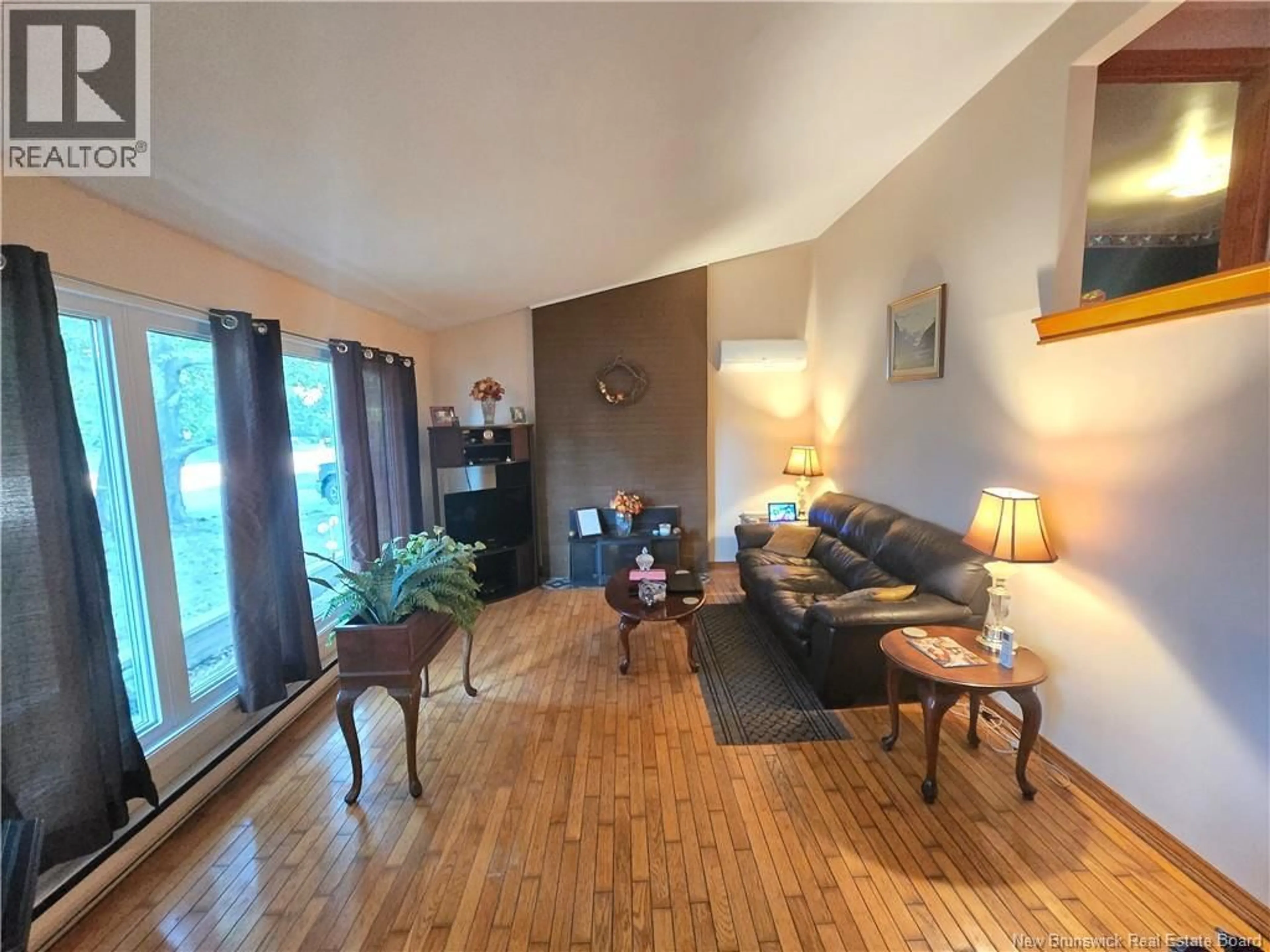 Living room with furniture, wood/laminate floor for 1205 CENTENNIAL STREET, Bathurst New Brunswick E2A4A9