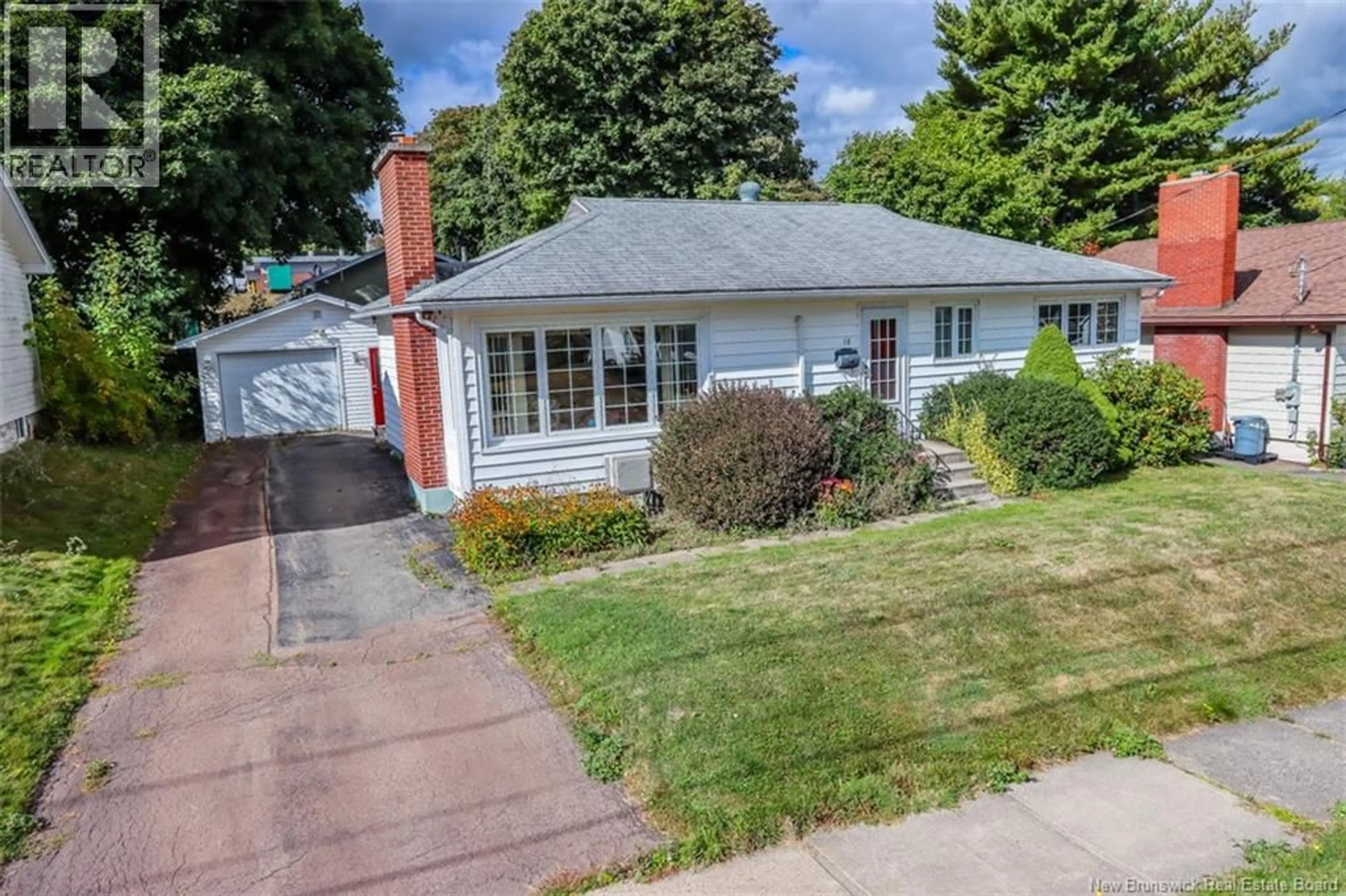 A pic from outside/outdoor area/front of a property/back of a property/a pic from drone, street for 18 CARNEY AVENUE, Moncton New Brunswick E1C4H5