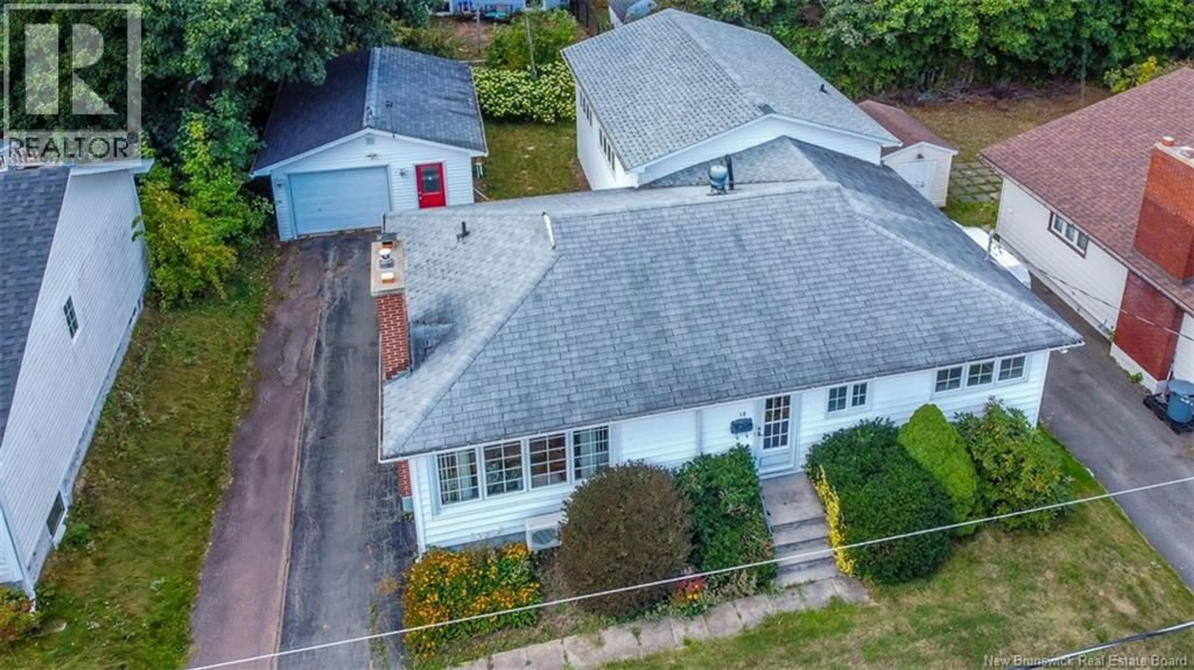 A pic from outside/outdoor area/front of a property/back of a property/a pic from drone, street for 18 CARNEY AVENUE, Moncton New Brunswick E1C4H5