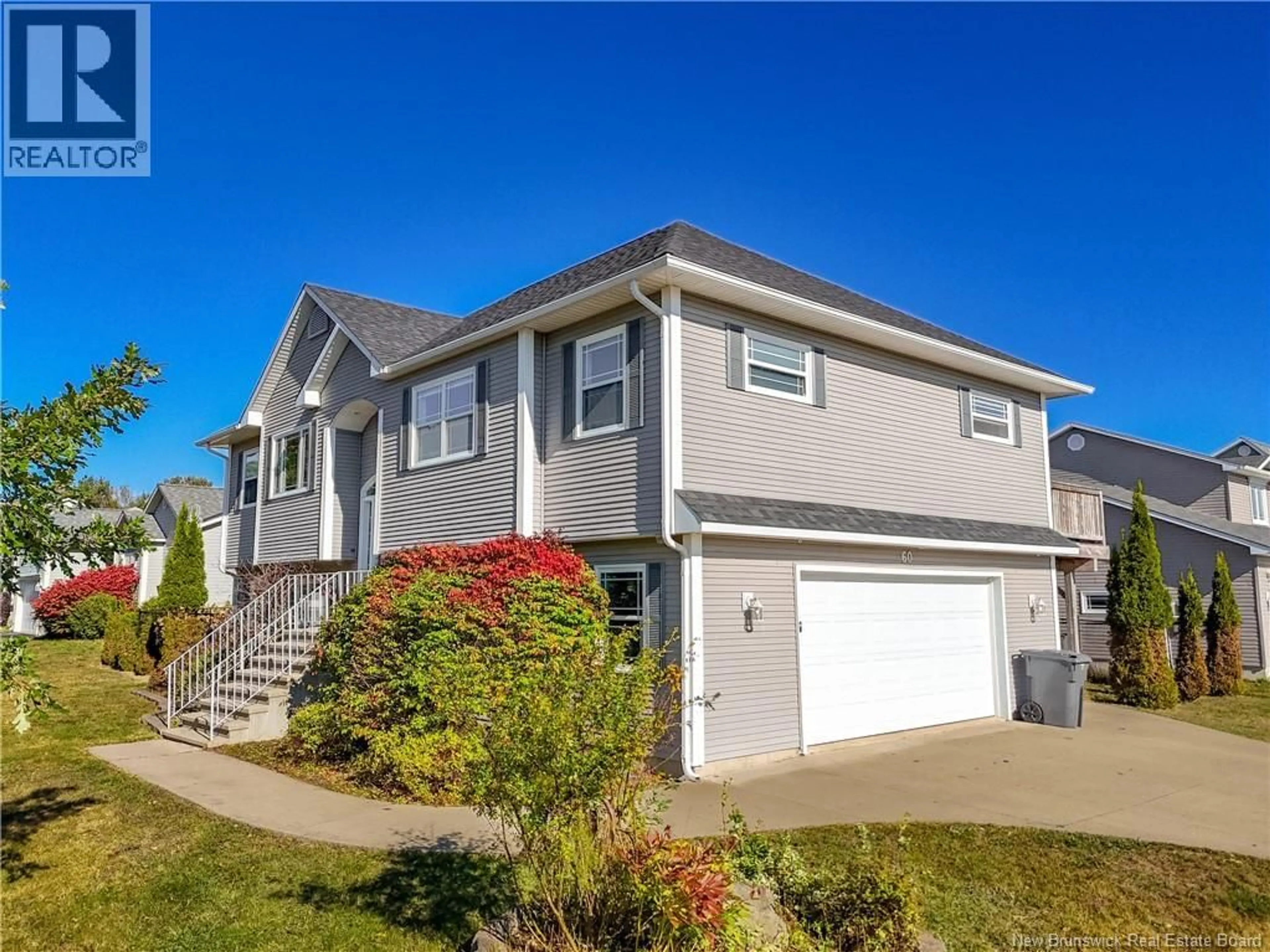 Home with vinyl exterior material, street for 60 HERON DRIVE, Fredericton New Brunswick E3G0X1