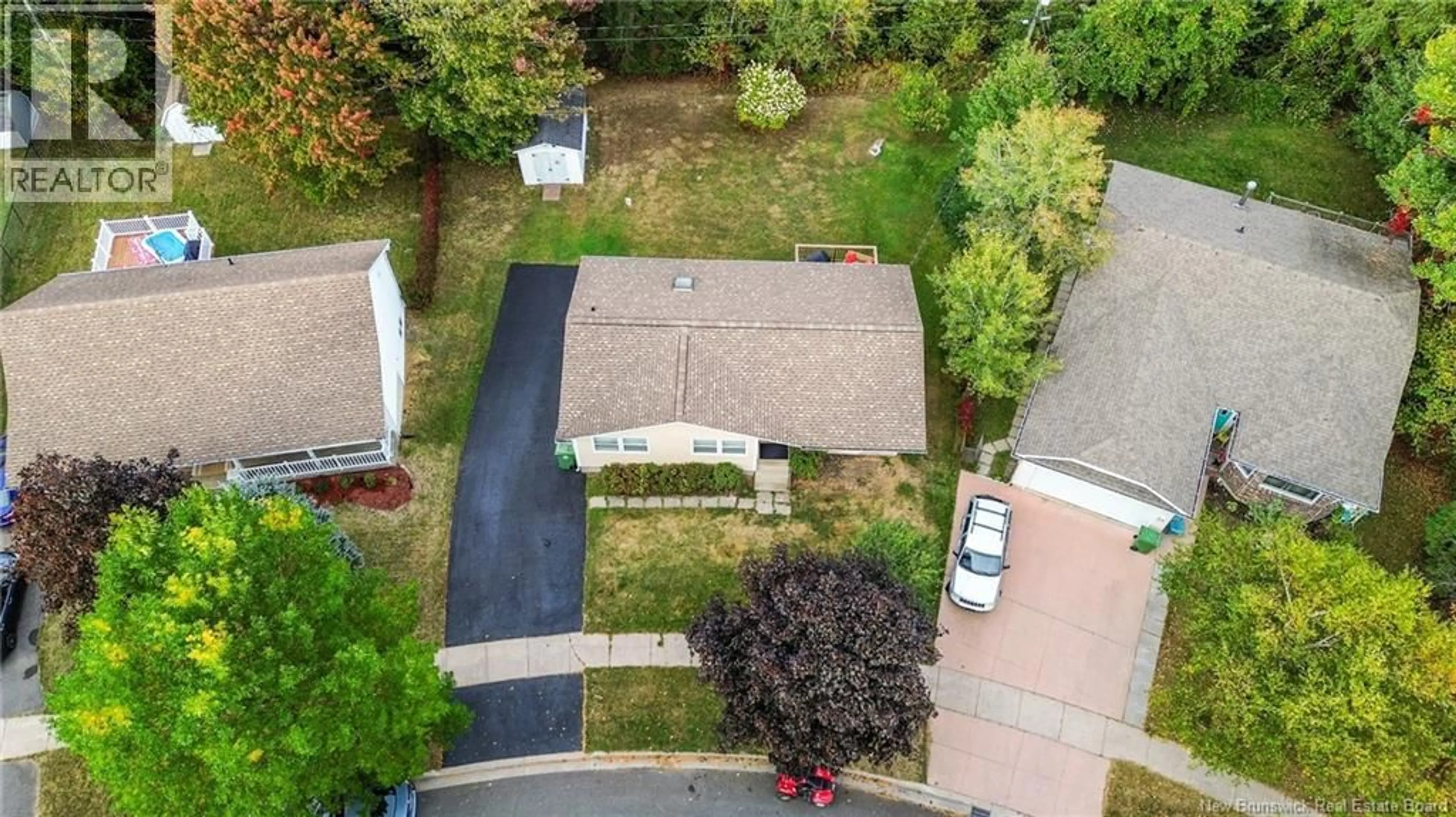 A pic from outside/outdoor area/front of a property/back of a property/a pic from drone, street for 28 PETTIGROVE CRESCENT, Fredericton New Brunswick E3A5P3