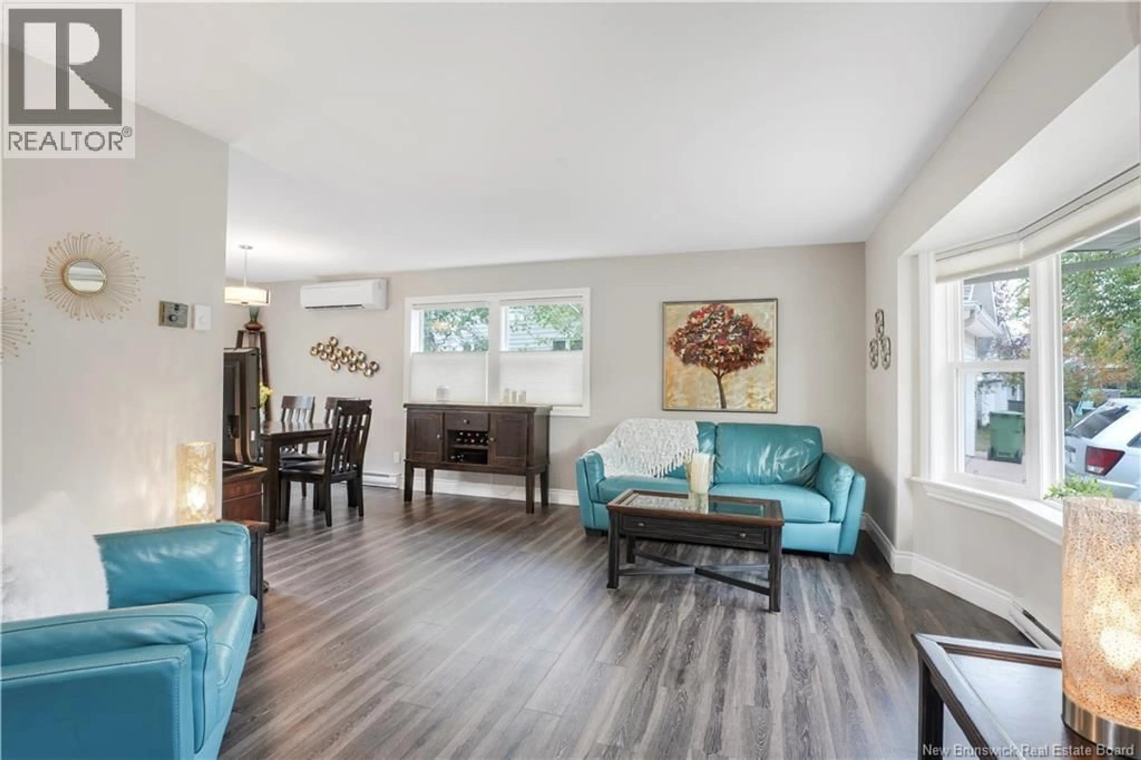 Living room with furniture, wood/laminate floor for 28 PETTIGROVE CRESCENT, Fredericton New Brunswick E3A5P3