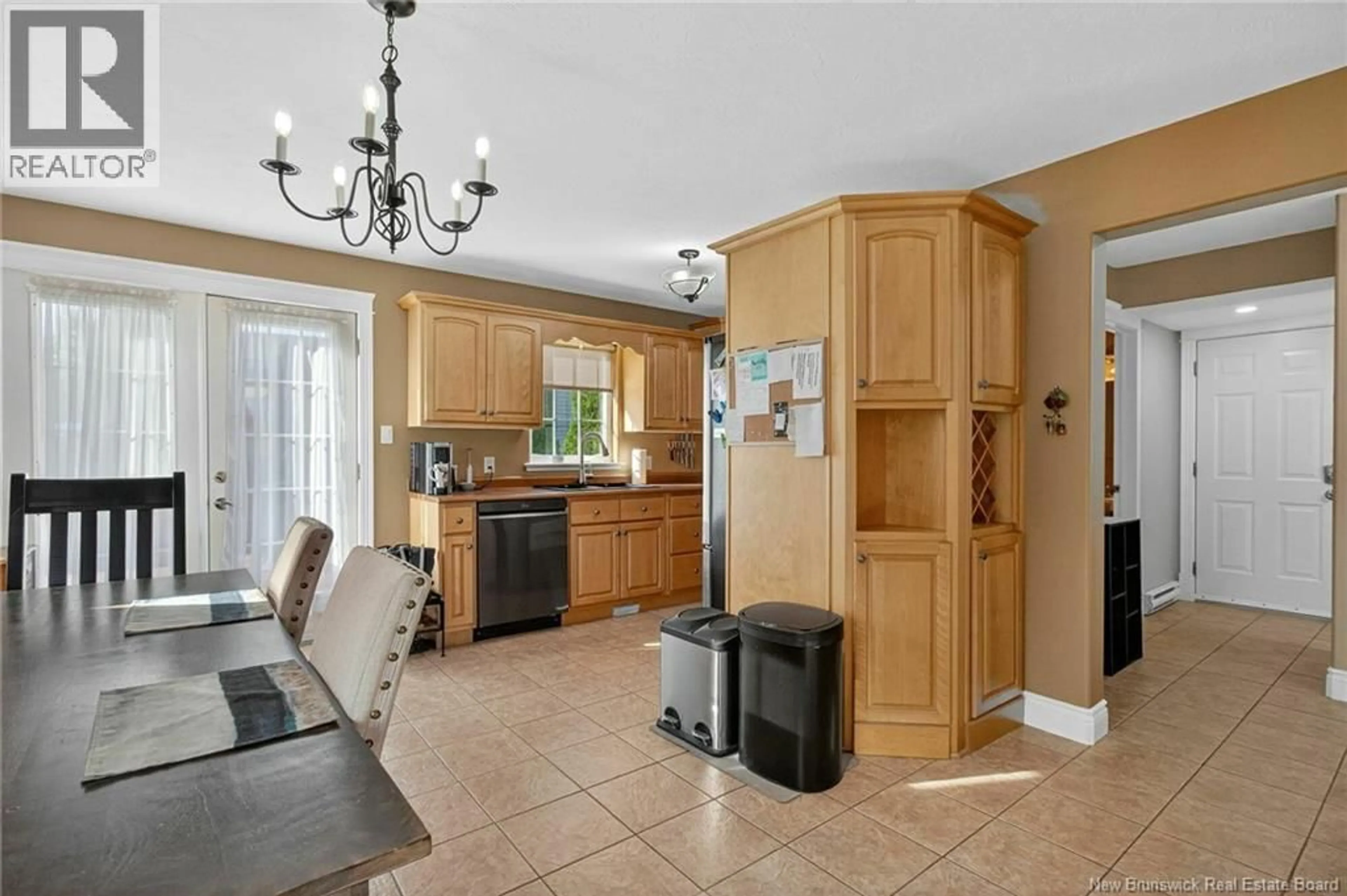Open concept kitchen, ceramic/tile floor for 16 CORTLAND COURT, Moncton New Brunswick E1A8C2