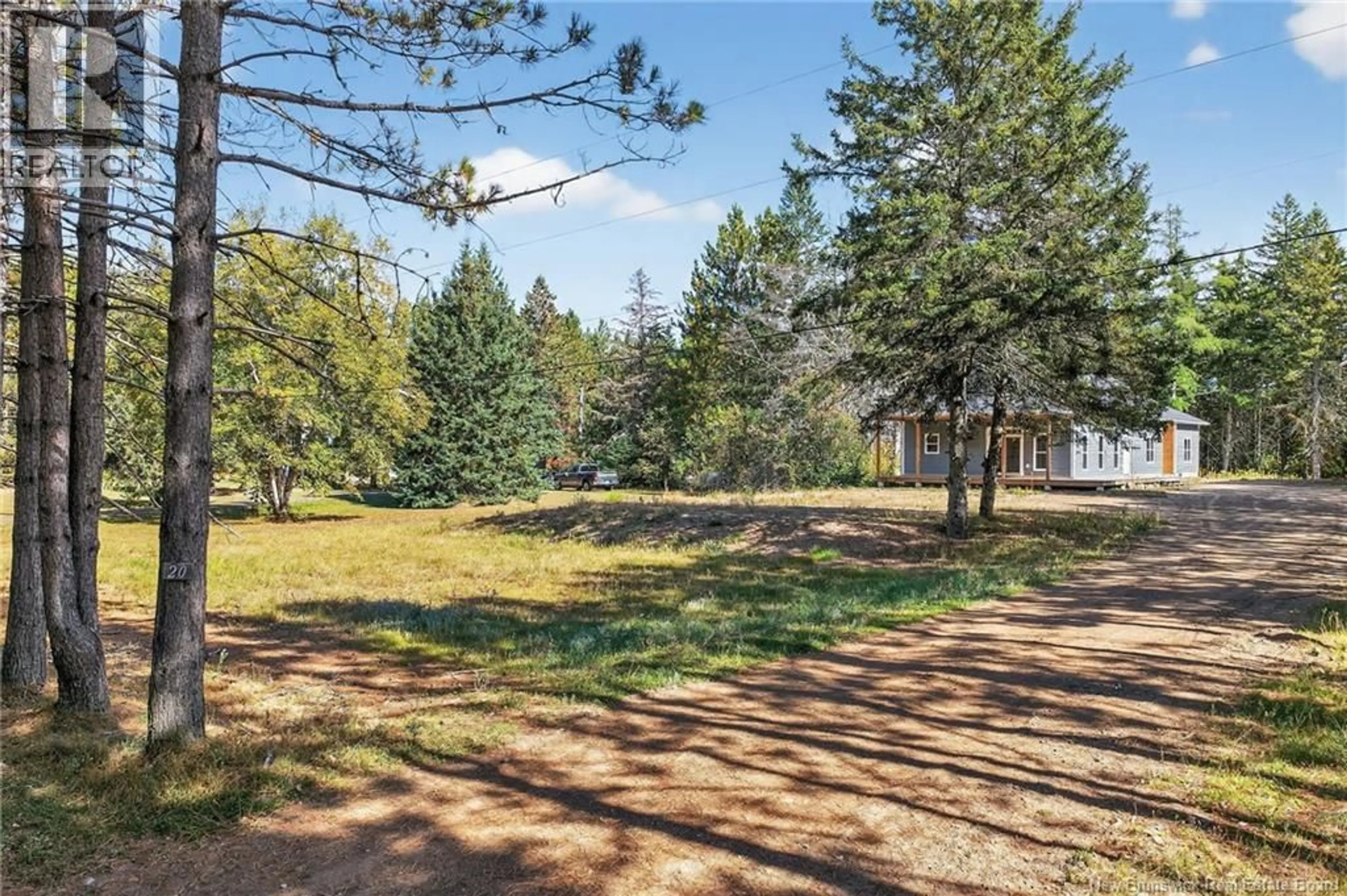 A pic from outside/outdoor area/front of a property/back of a property/a pic from drone, forest/trees view for 20 EMERY LANE, Shediac River New Brunswick E4R6A4