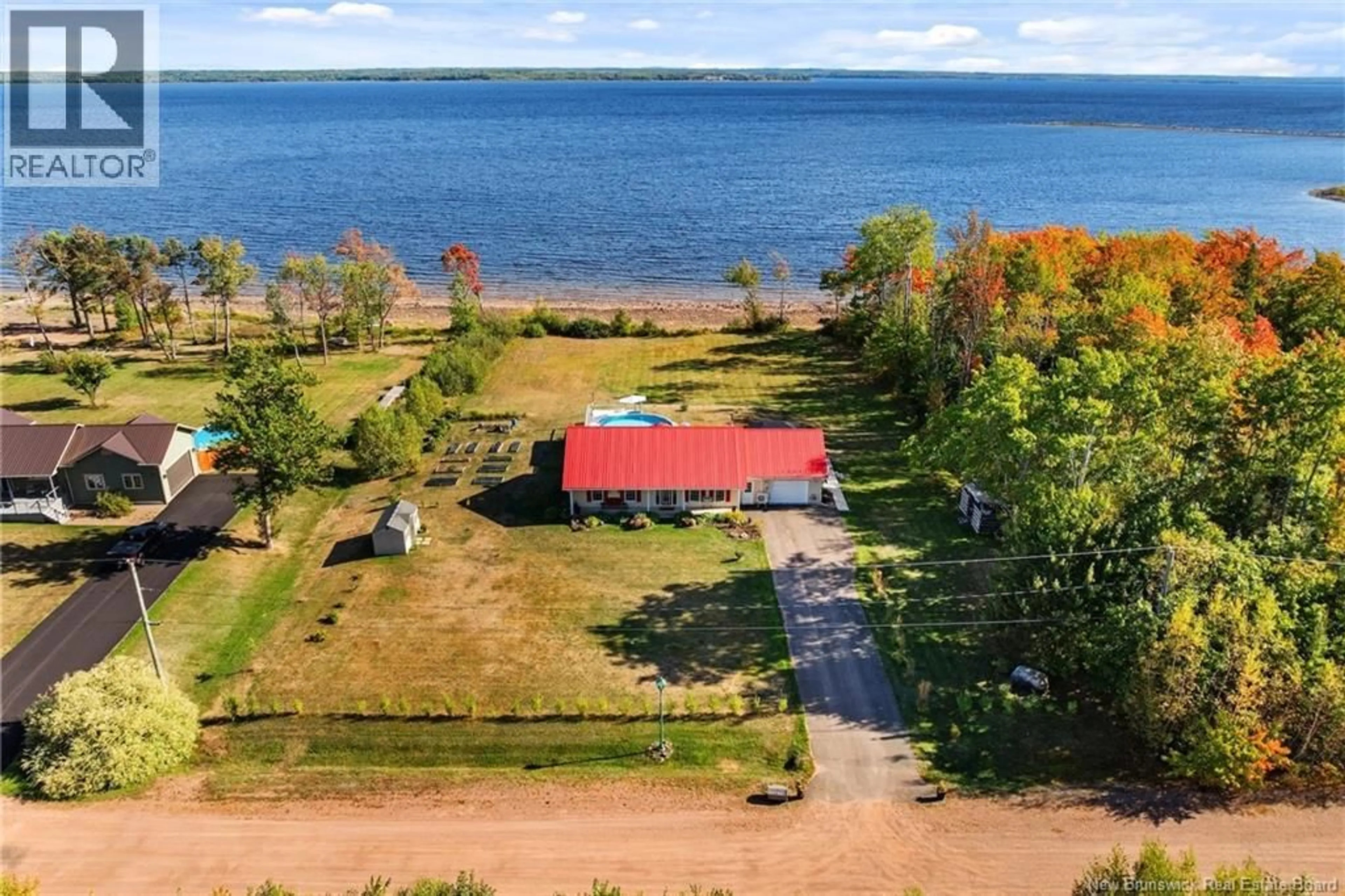 A pic from outside/outdoor area/front of a property/back of a property/a pic from drone, water/lake/river/ocean view for 20 SUNVIEW LANE, Wuhrs Beach New Brunswick E4B4C2