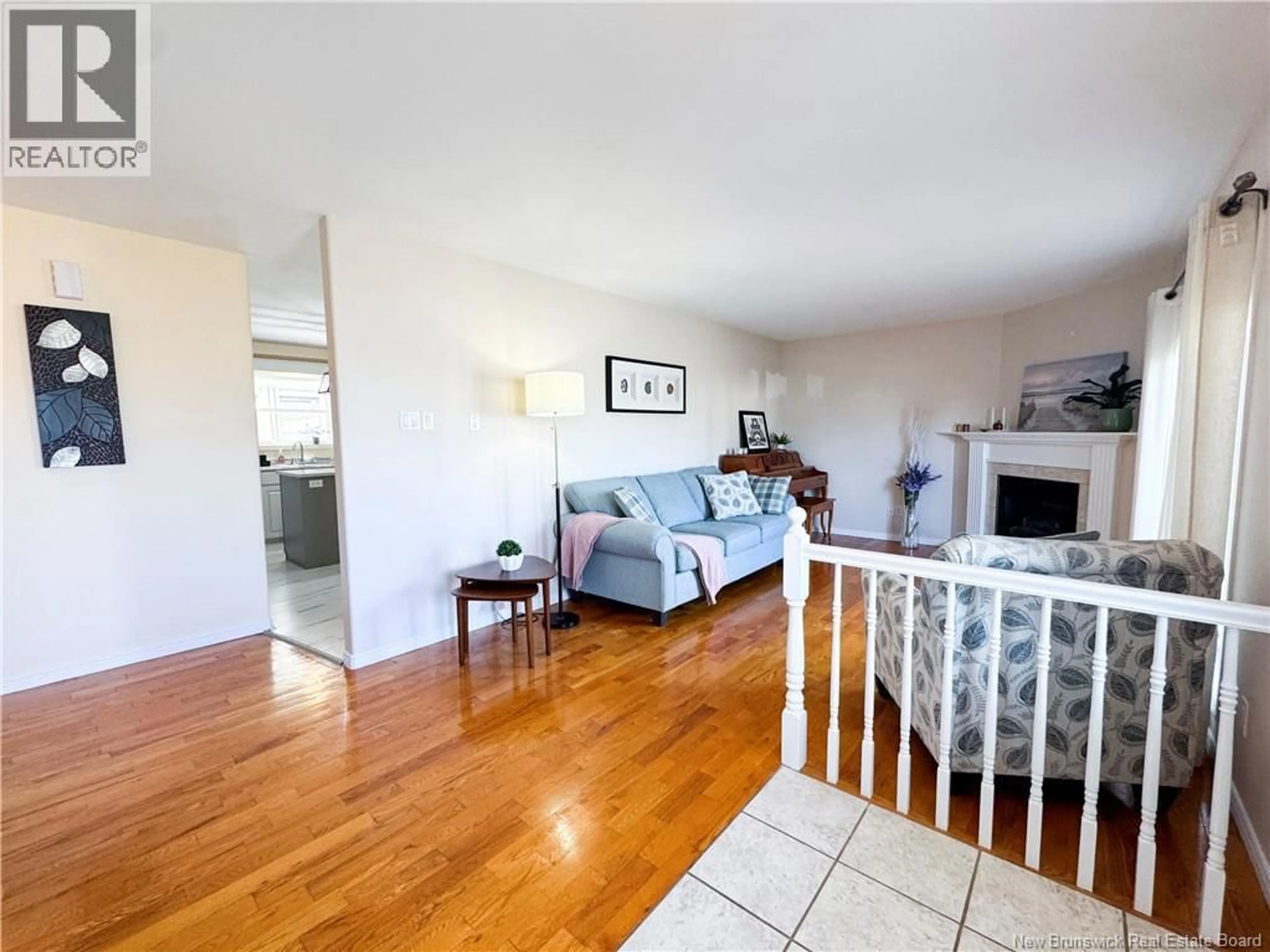 Living room with furniture, wood/laminate floor for 68 PENROSE STREET, Moncton New Brunswick E1E4N9